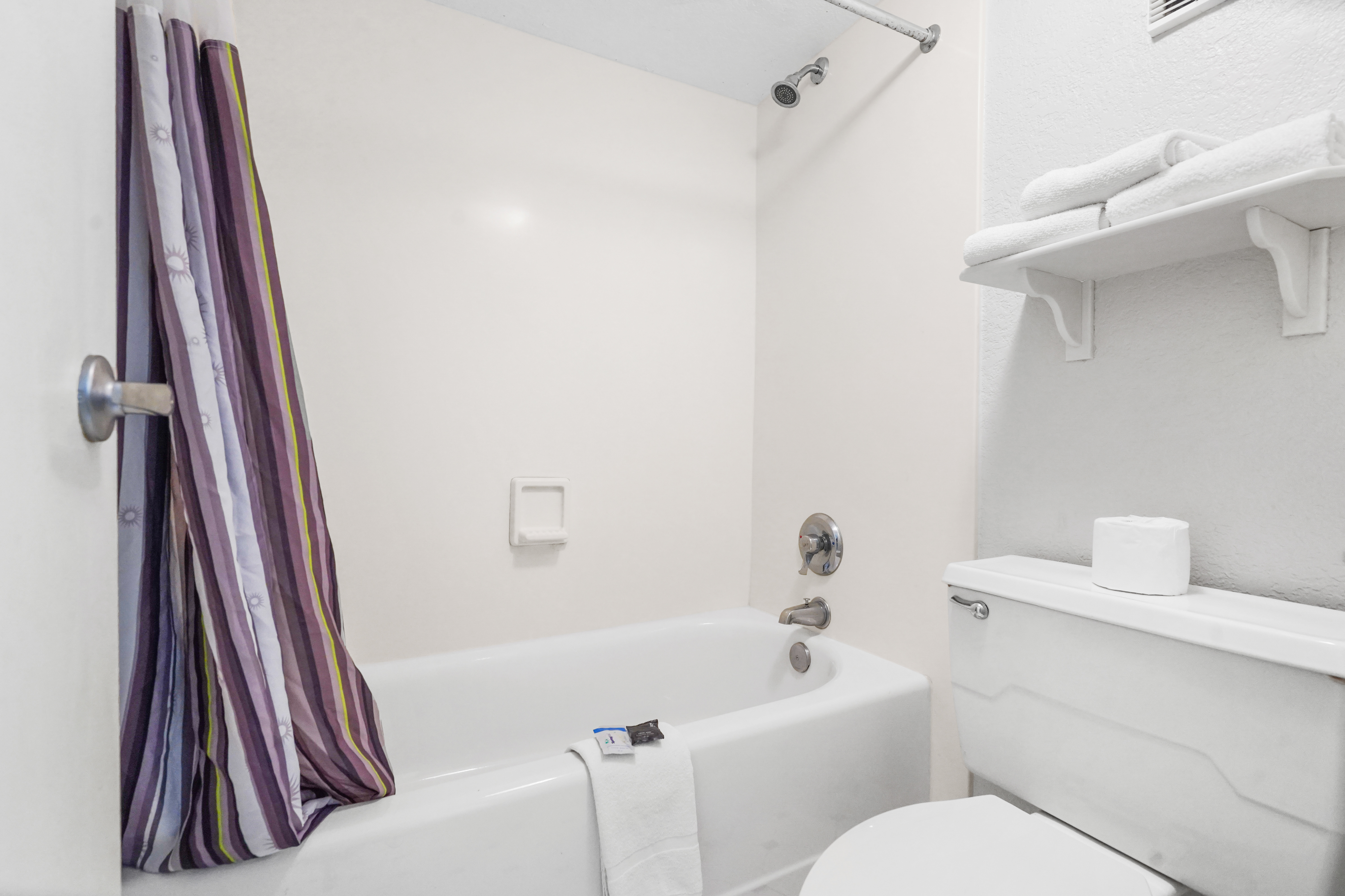 Guest room bath at the La Quinta Inn by Wyndham Costa Mesa / Newport Beach in Costa Mesa, California