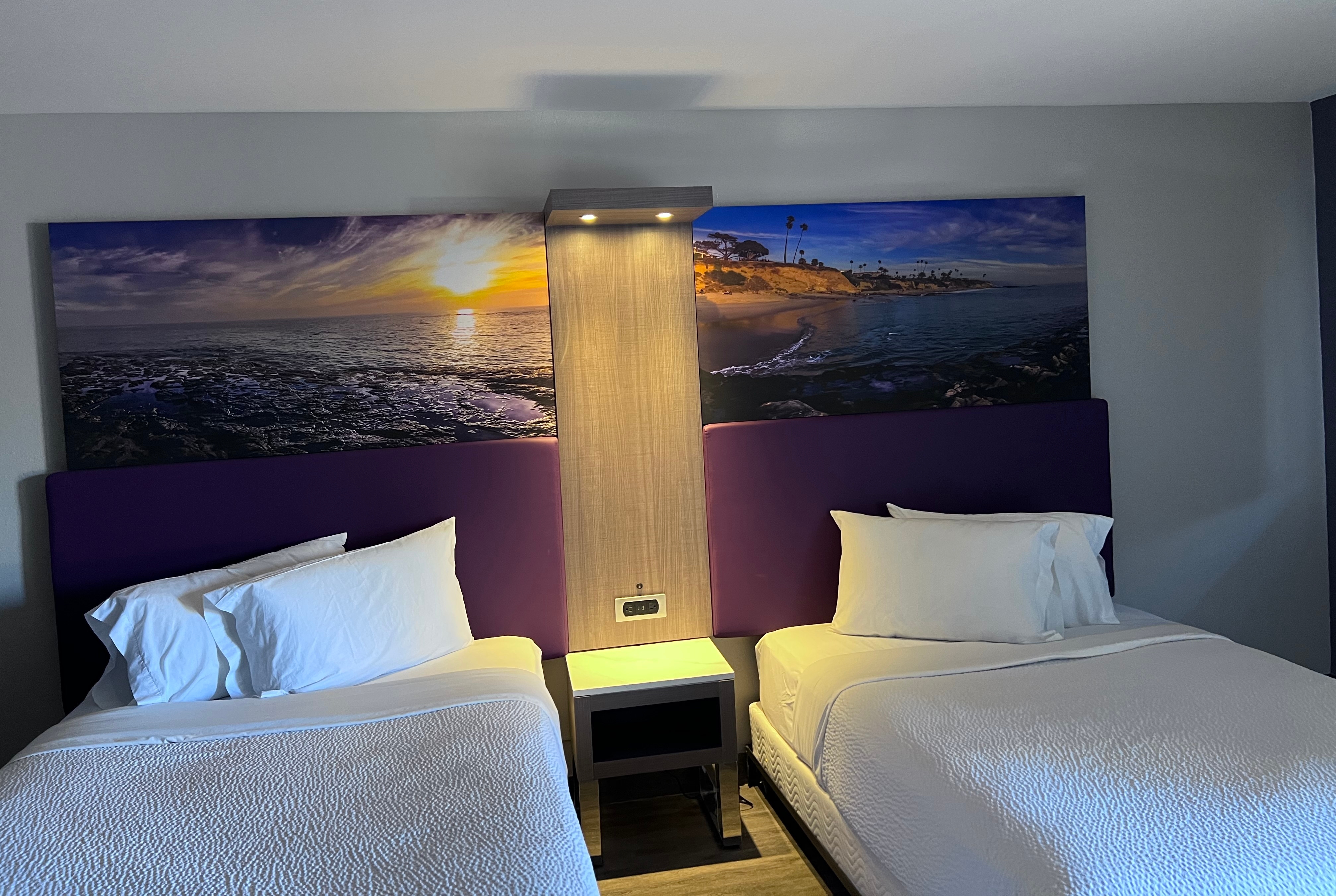 Queen bed guest room at the La Quinta Inn by Wyndham Costa Mesa / Newport Beach in Costa Mesa, California