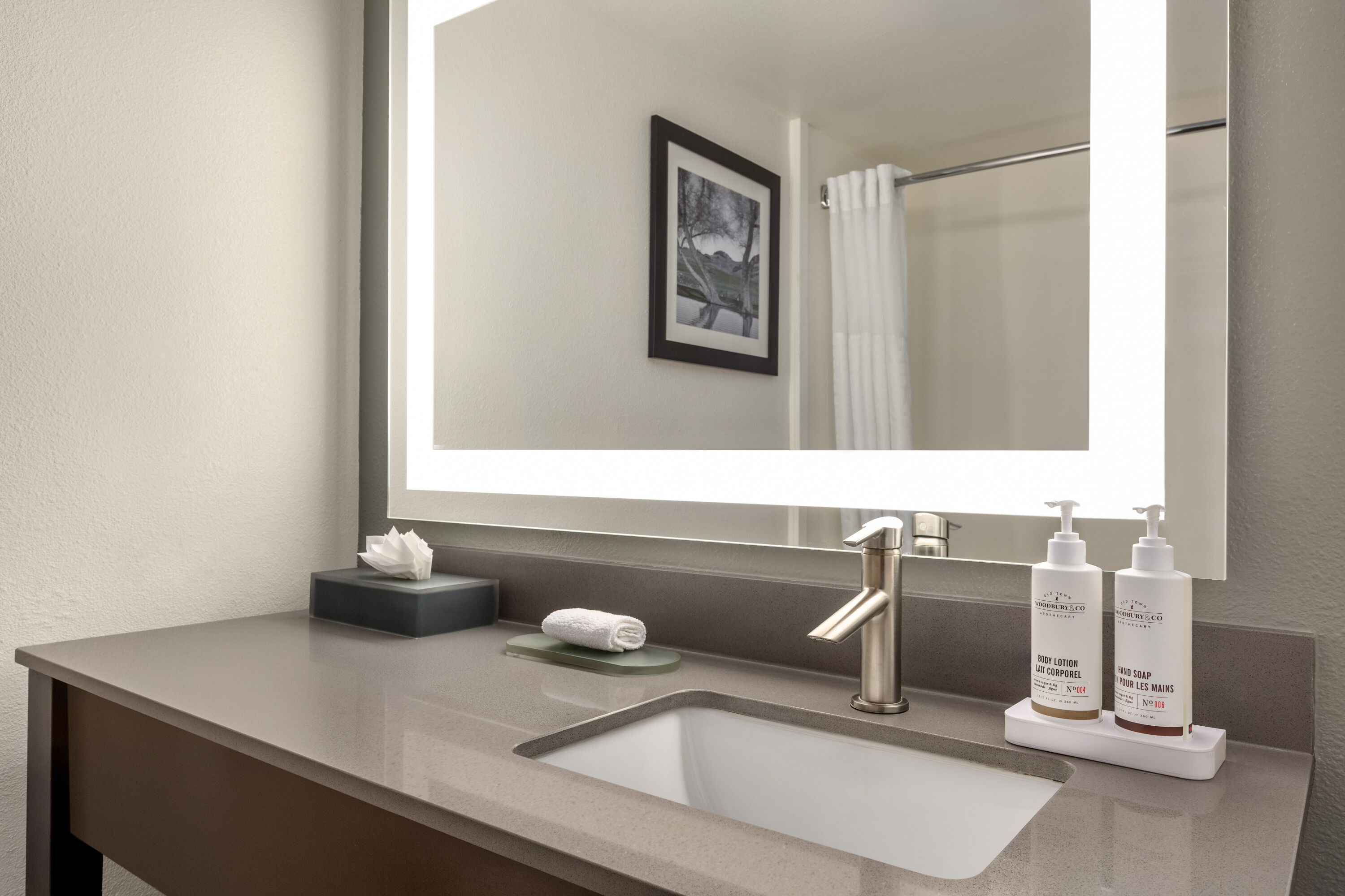 Guest room bath at the La Quinta Inn & Suites by Wyndham Fairfield - Napa Valley in Fairfield, California