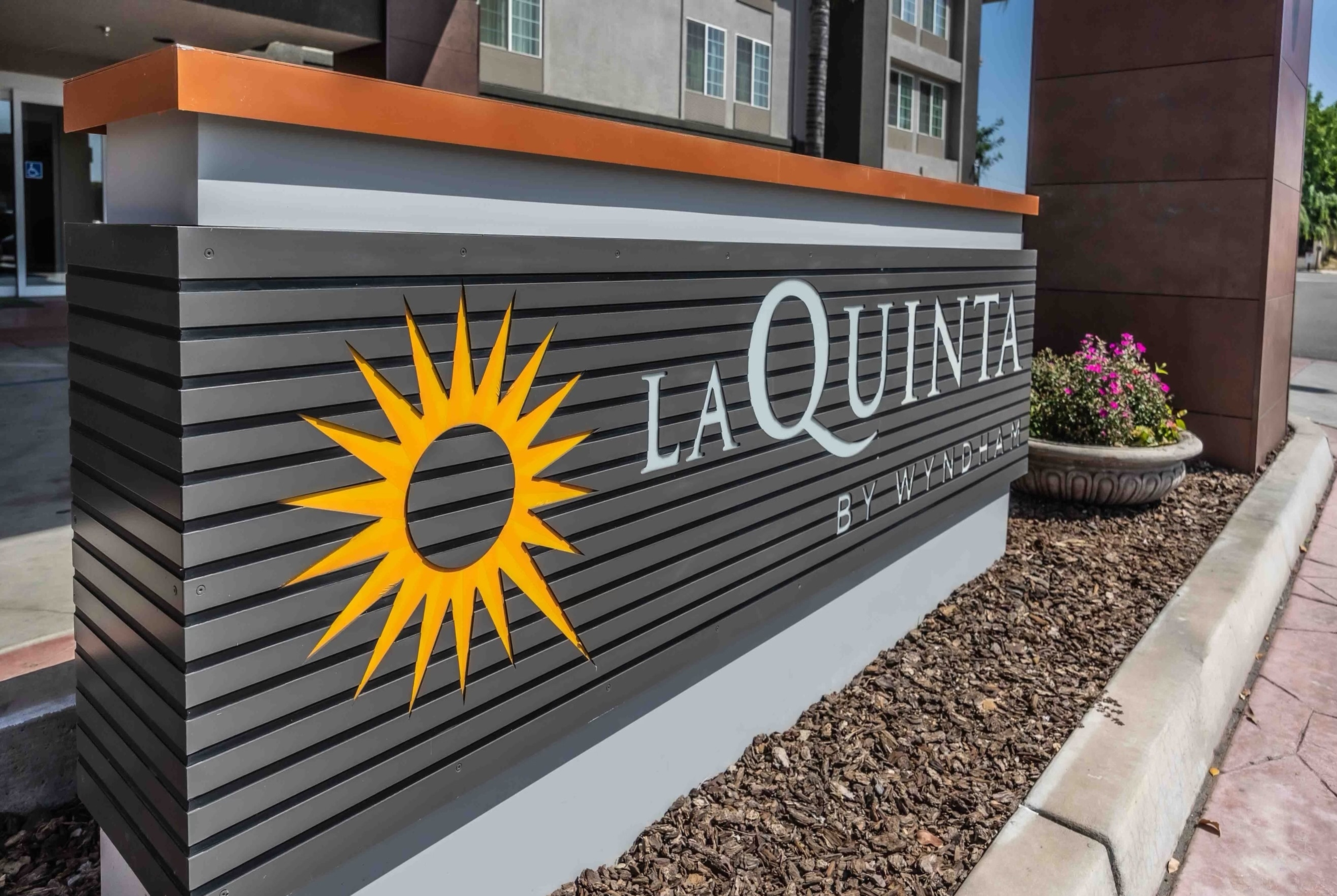 Exterior of La Quinta Inn & Suites by Wyndham Fowler hotel in Fowler, California
