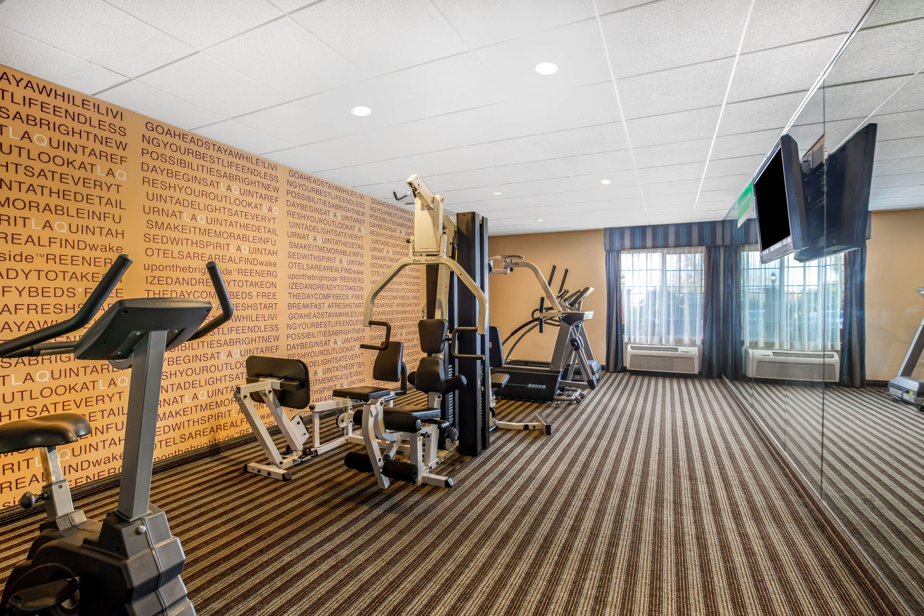 Fitness room at La Quinta Inn & Suites by Wyndham Fowler in Fowler, California