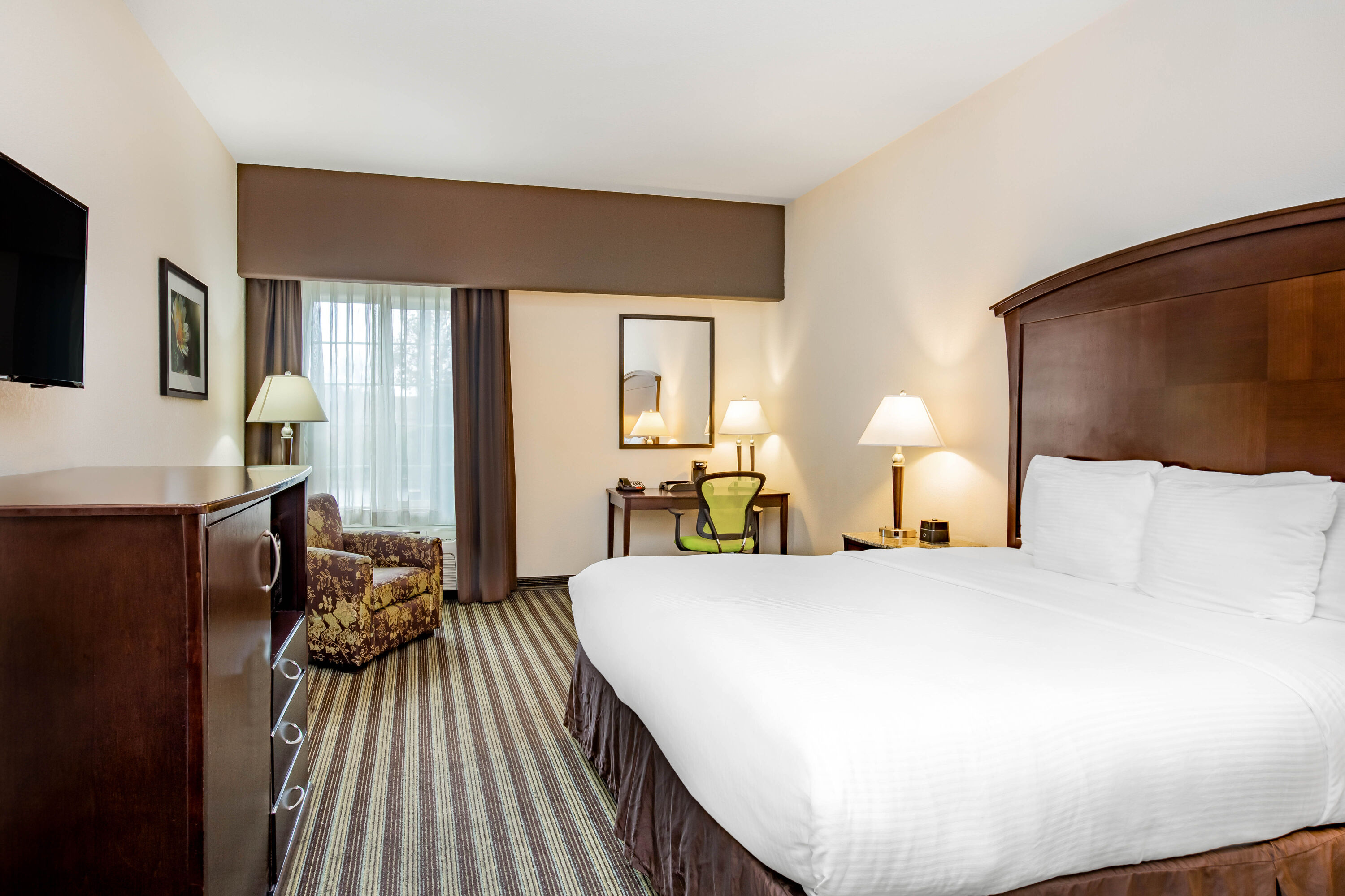 Guest room at the La Quinta Inn & Suites by Wyndham Fowler in Fowler, California