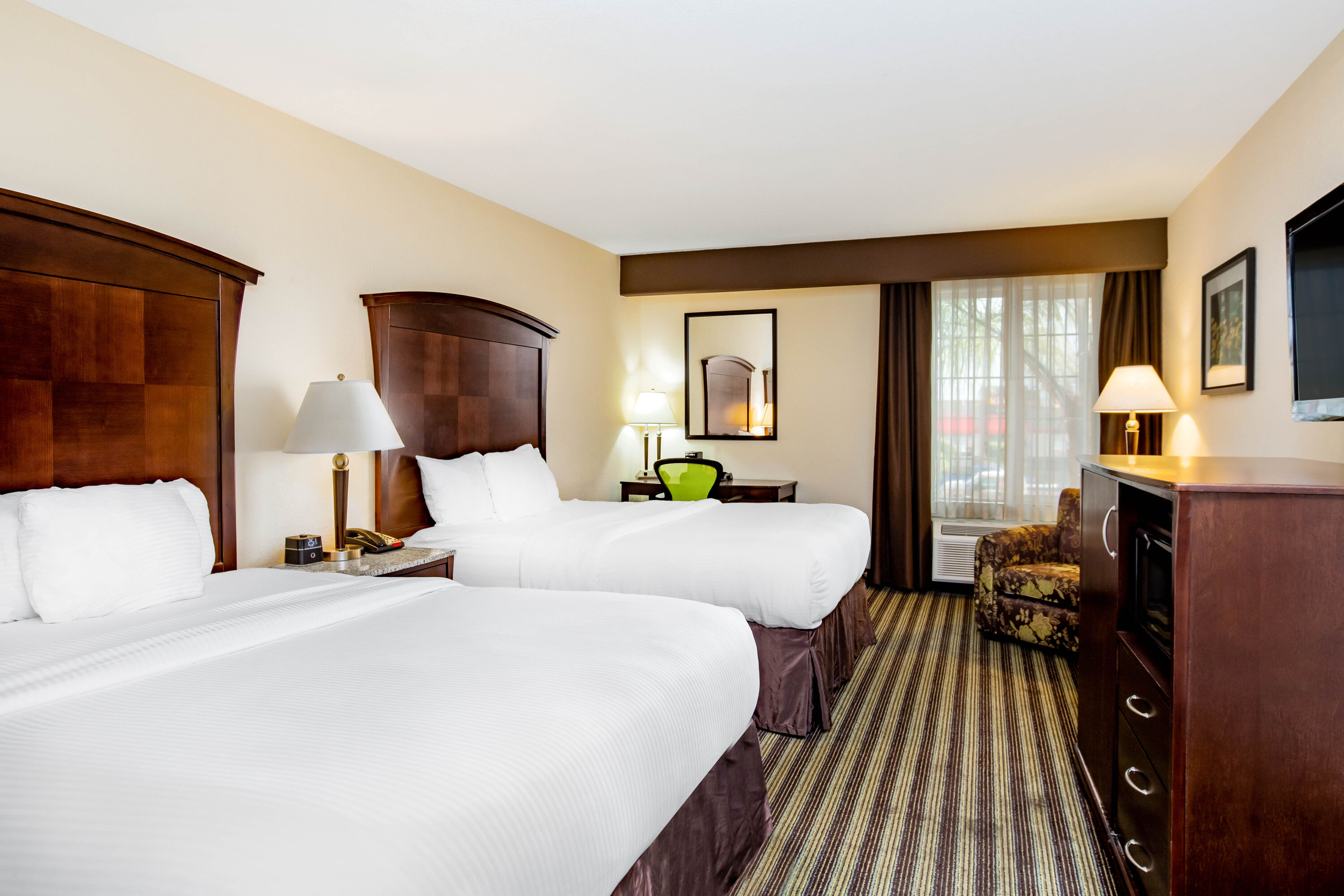 Guest room at the La Quinta Inn & Suites by Wyndham Fowler in Fowler, California