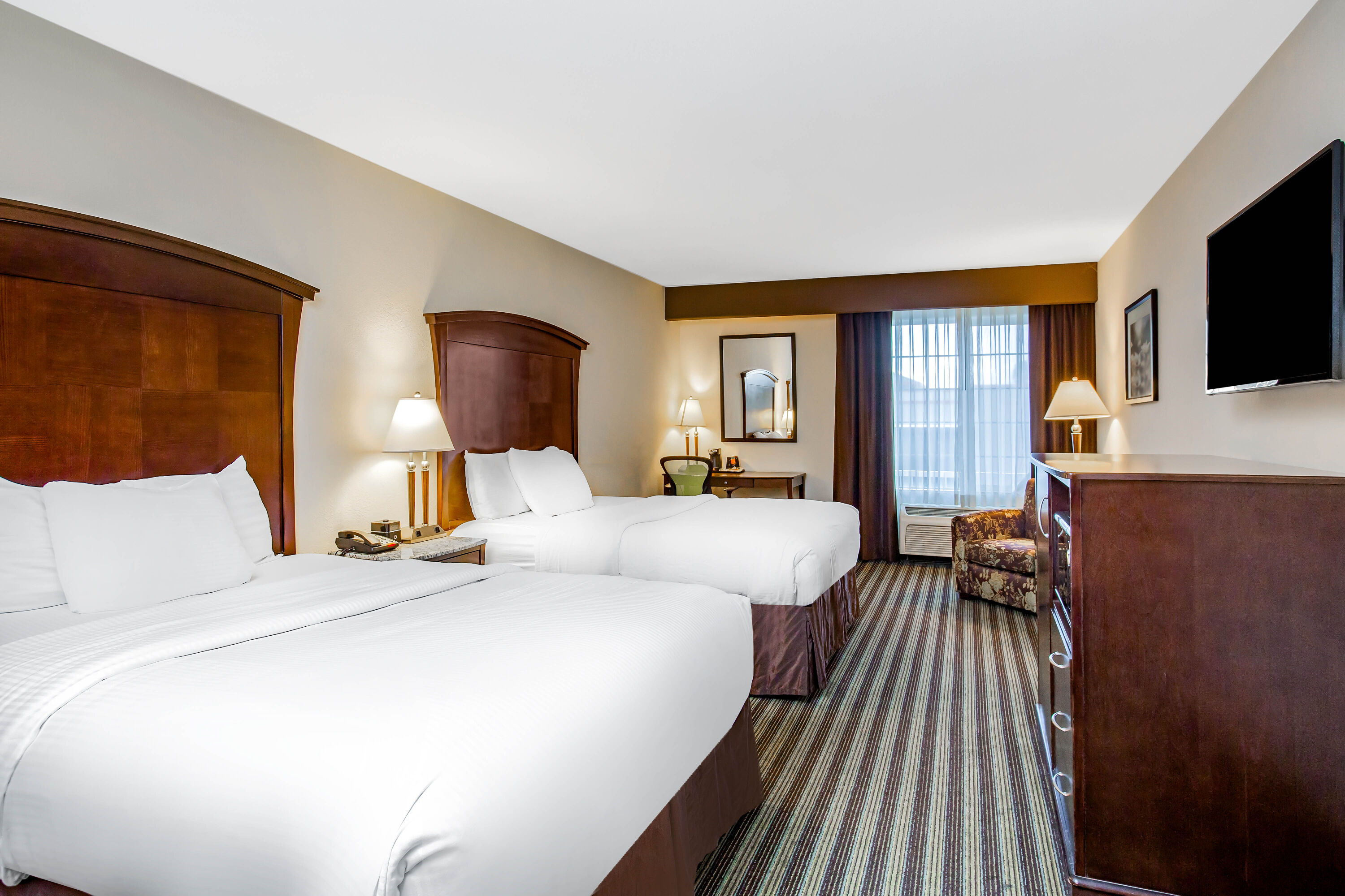 Guest room at the La Quinta Inn & Suites by Wyndham Fowler in Fowler, California