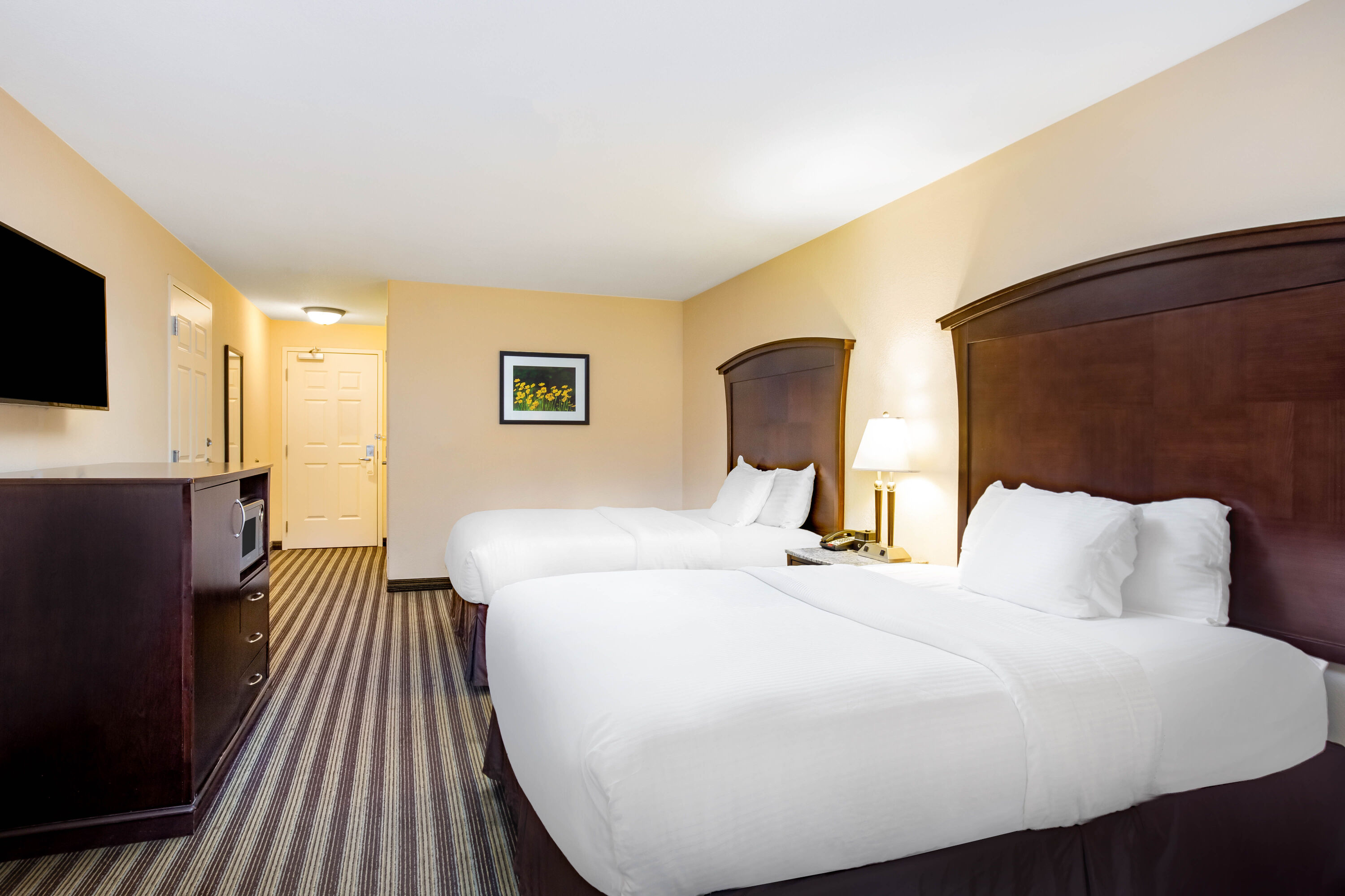 Guest room at the La Quinta Inn & Suites by Wyndham Fowler in Fowler, California