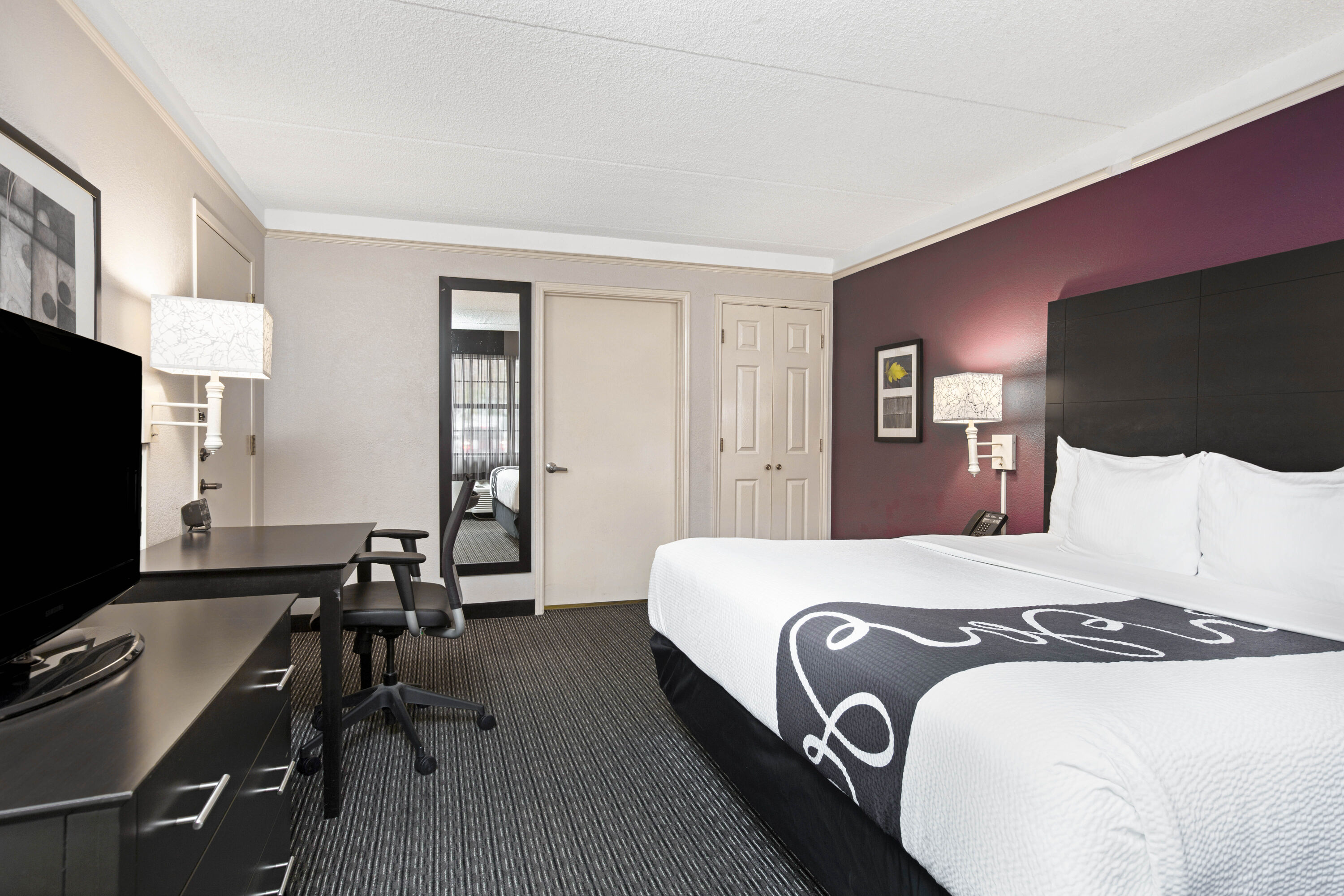 Guest room at the La Quinta Inn by Wyndham Fresno Yosemite in Fresno, California