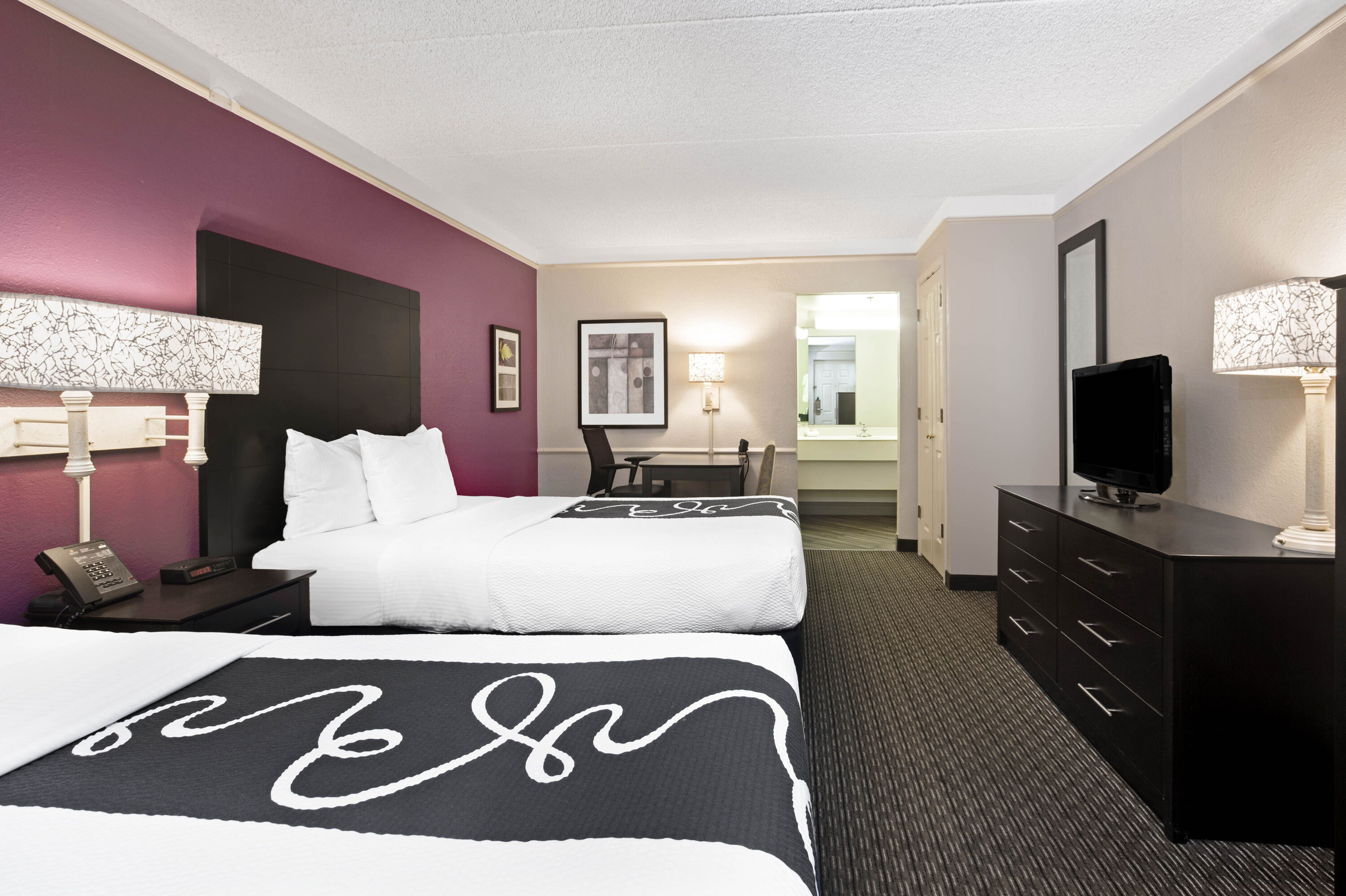 Guest room at the La Quinta Inn by Wyndham Fresno Yosemite in Fresno, California