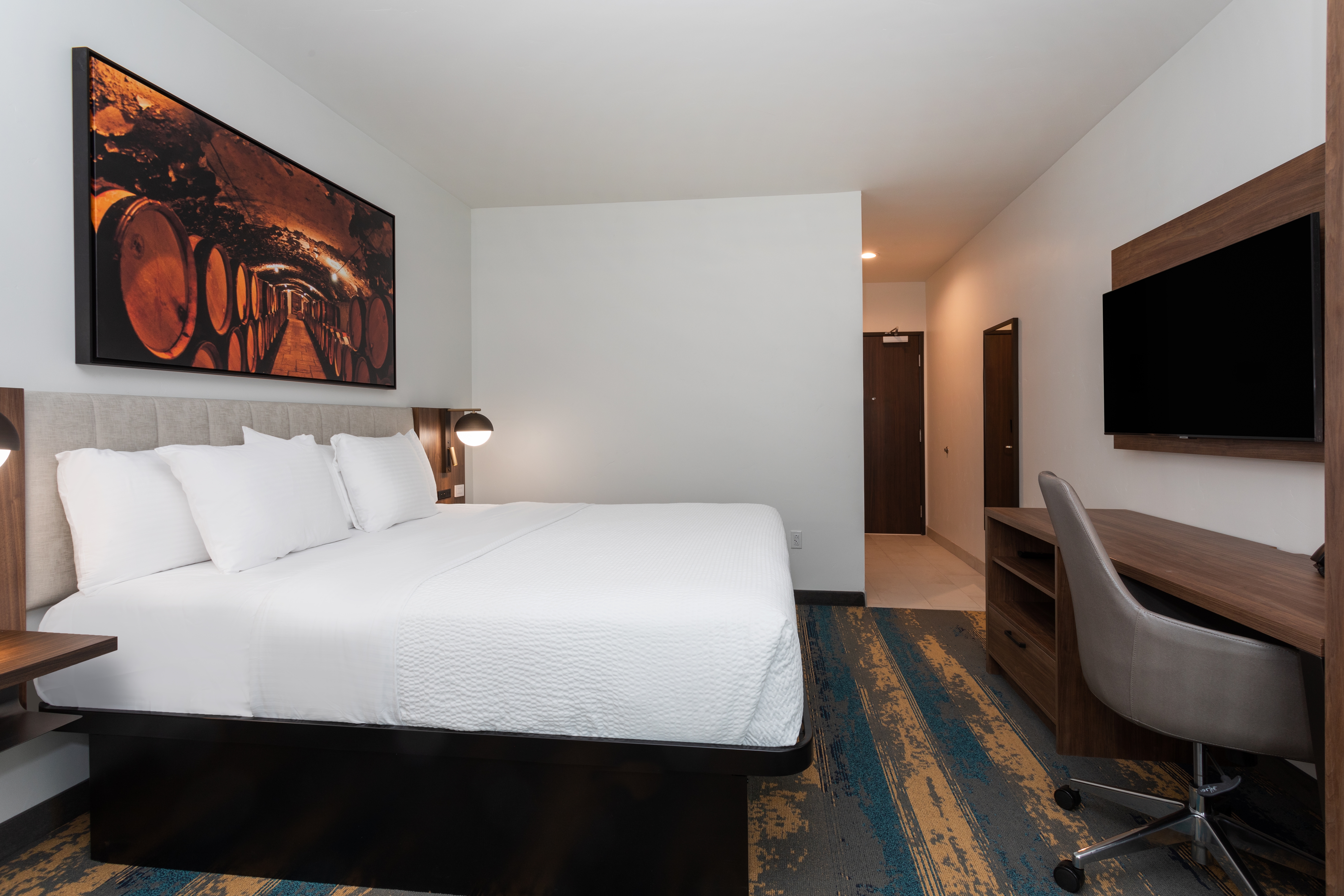 Guest room at the La Quinta Inn & Suites by Wyndham Galt Lodi North in Galt, California