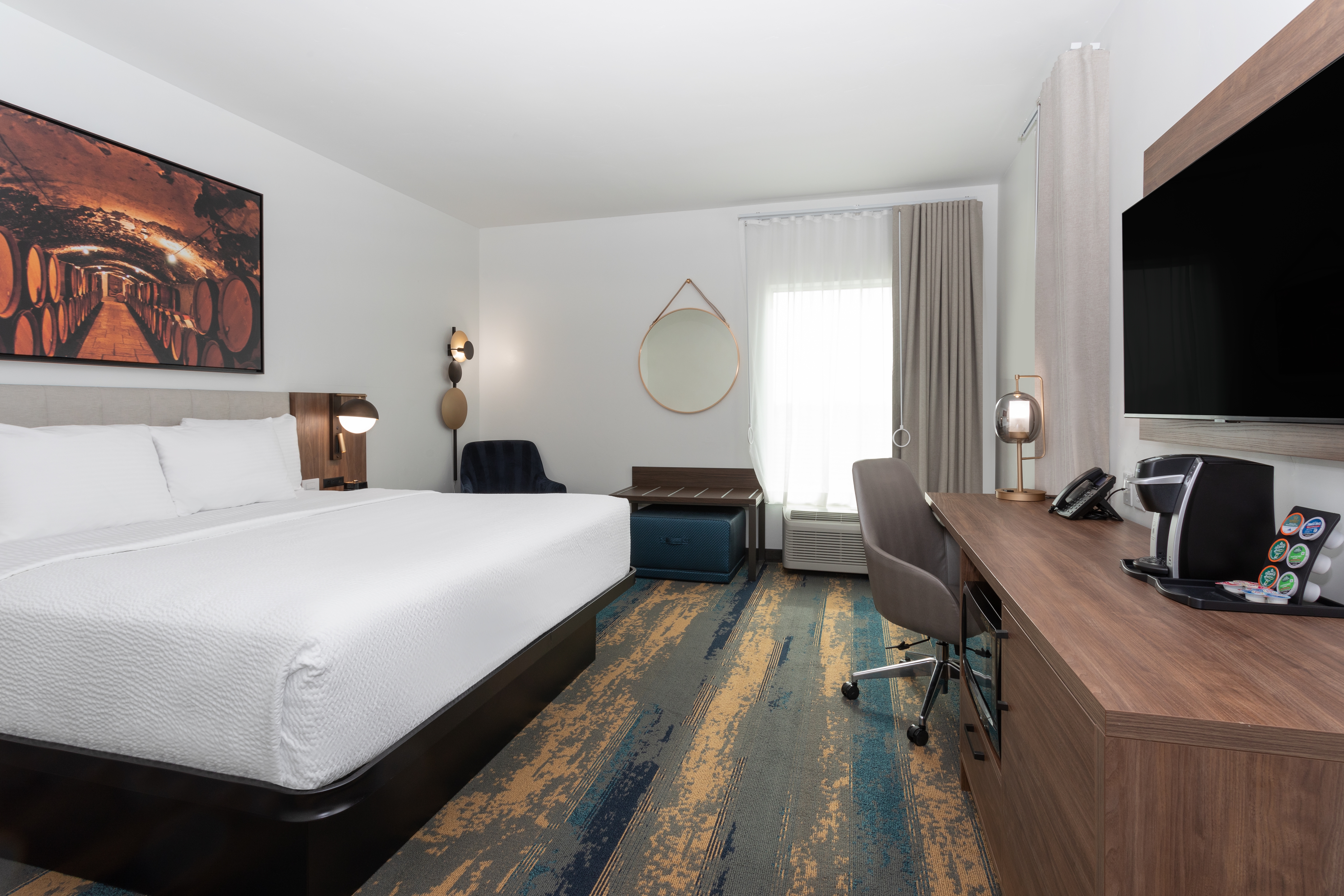 Guest room at the La Quinta Inn & Suites by Wyndham Galt Lodi North in Galt, California