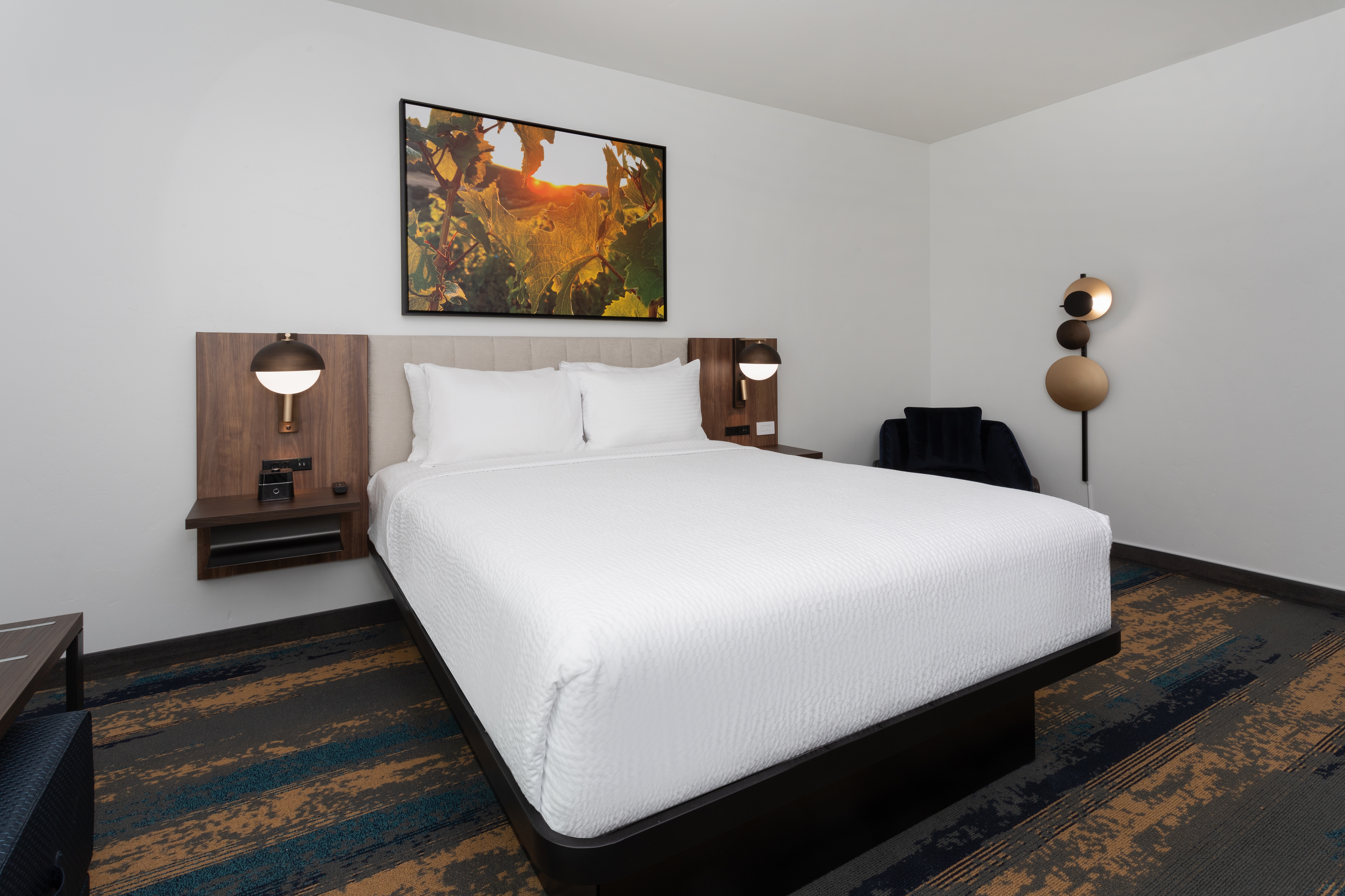 Guest room at the La Quinta Inn & Suites by Wyndham Galt Lodi North in Galt, California