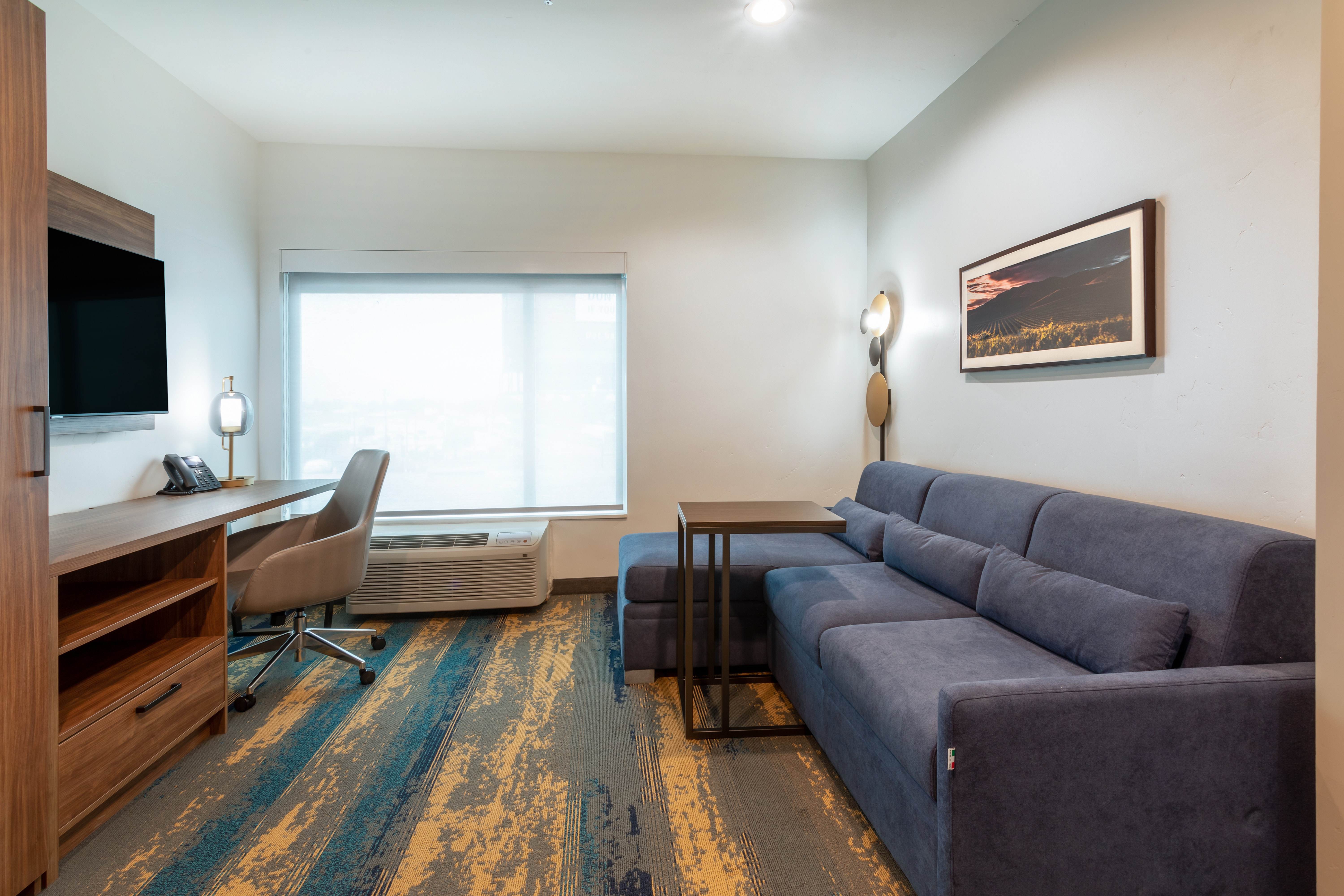 Guest room at the La Quinta Inn & Suites by Wyndham Galt Lodi North in Galt, California