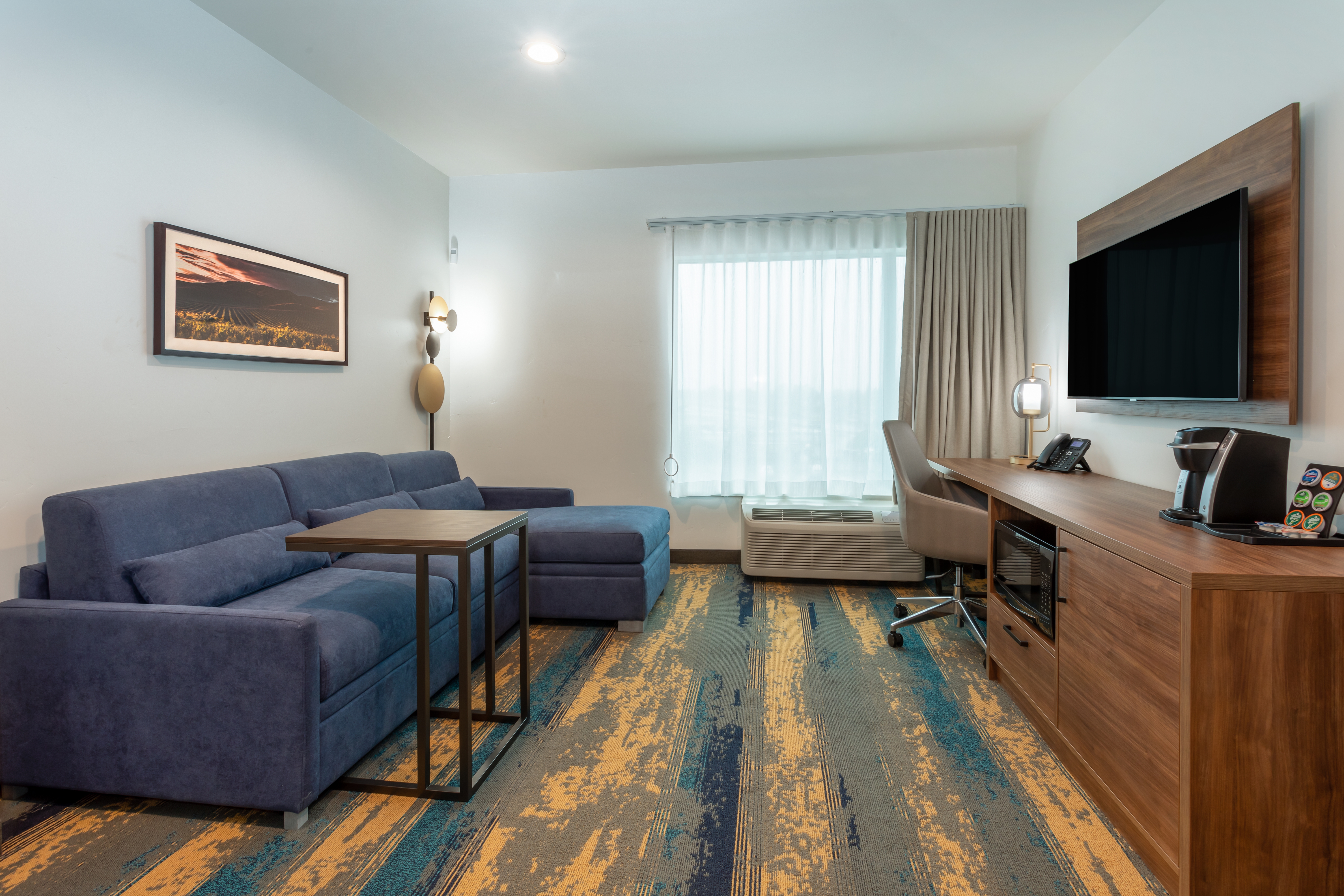 Guest room at the La Quinta Inn & Suites by Wyndham Galt Lodi North in Galt, California