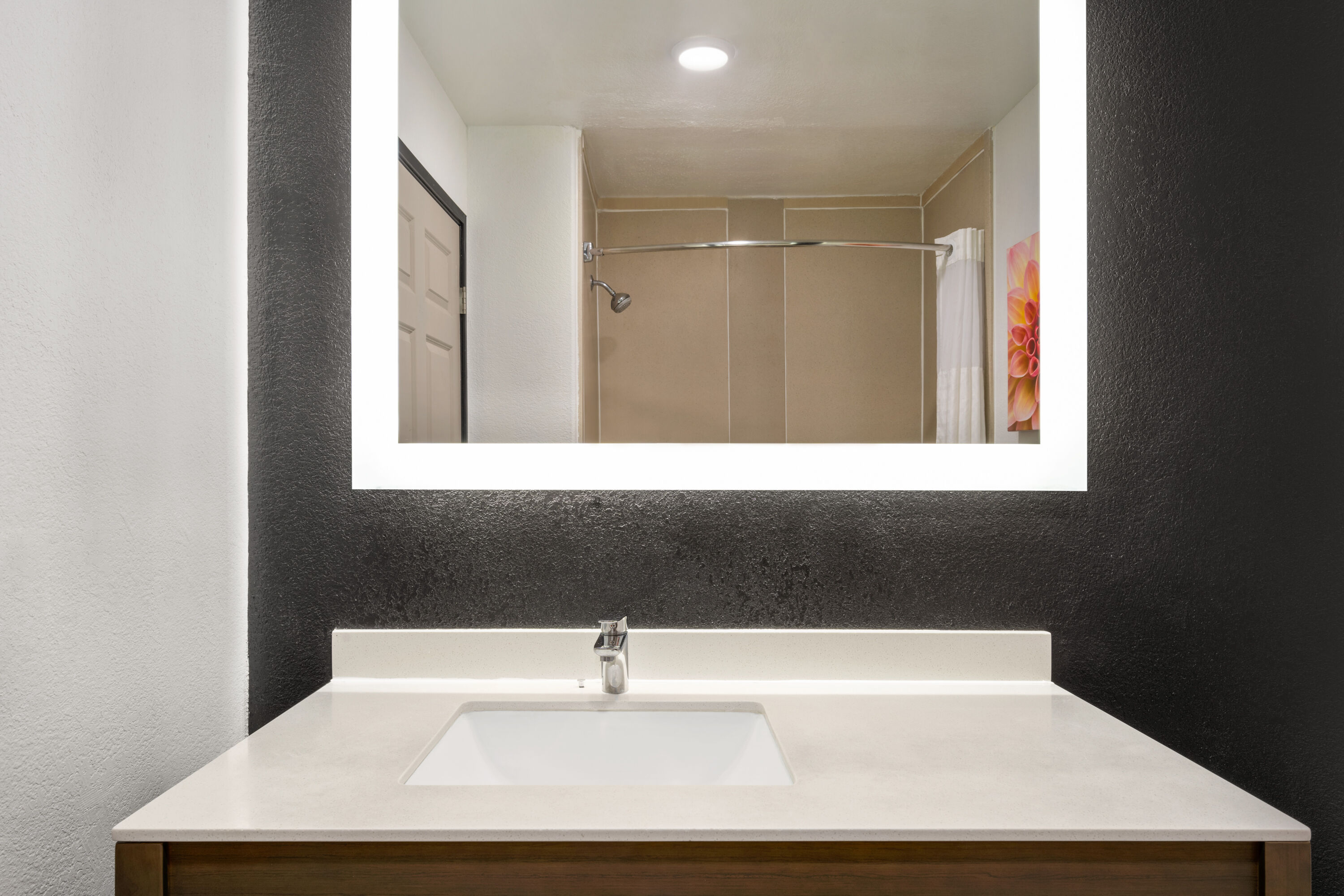 Guest room bath at the La Quinta Inn & Suites by Wyndham Hesperia Victorville in Hesperia, California