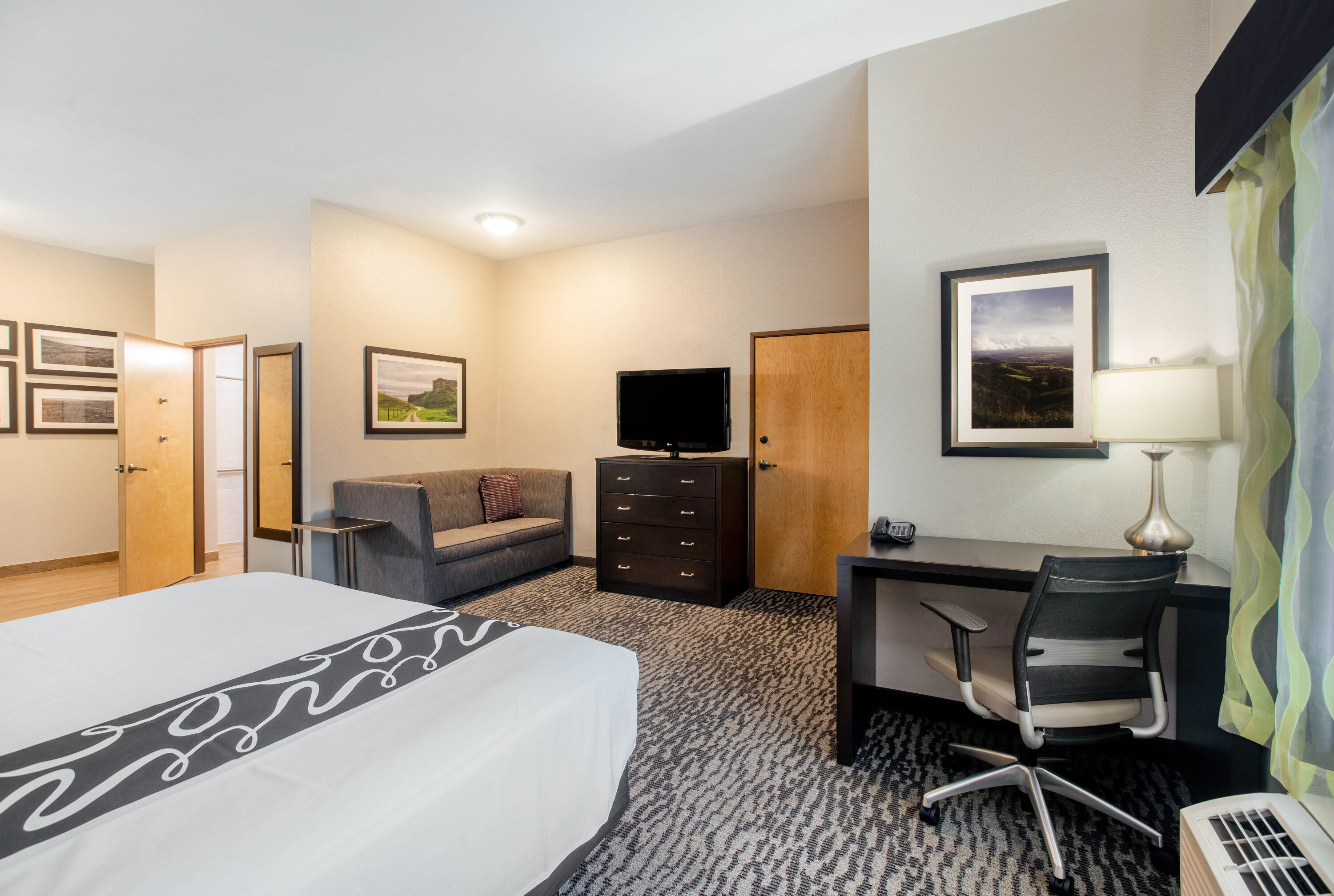 Guest room at the La Quinta Inn by Wyndham Livermore in Livermore, California