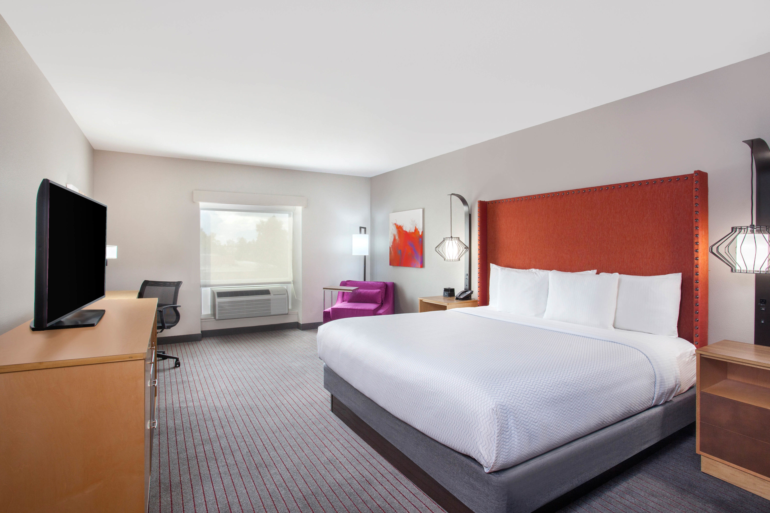 Guest room at the La Quinta Inn & Suites by Wyndham Madera in Madera, California