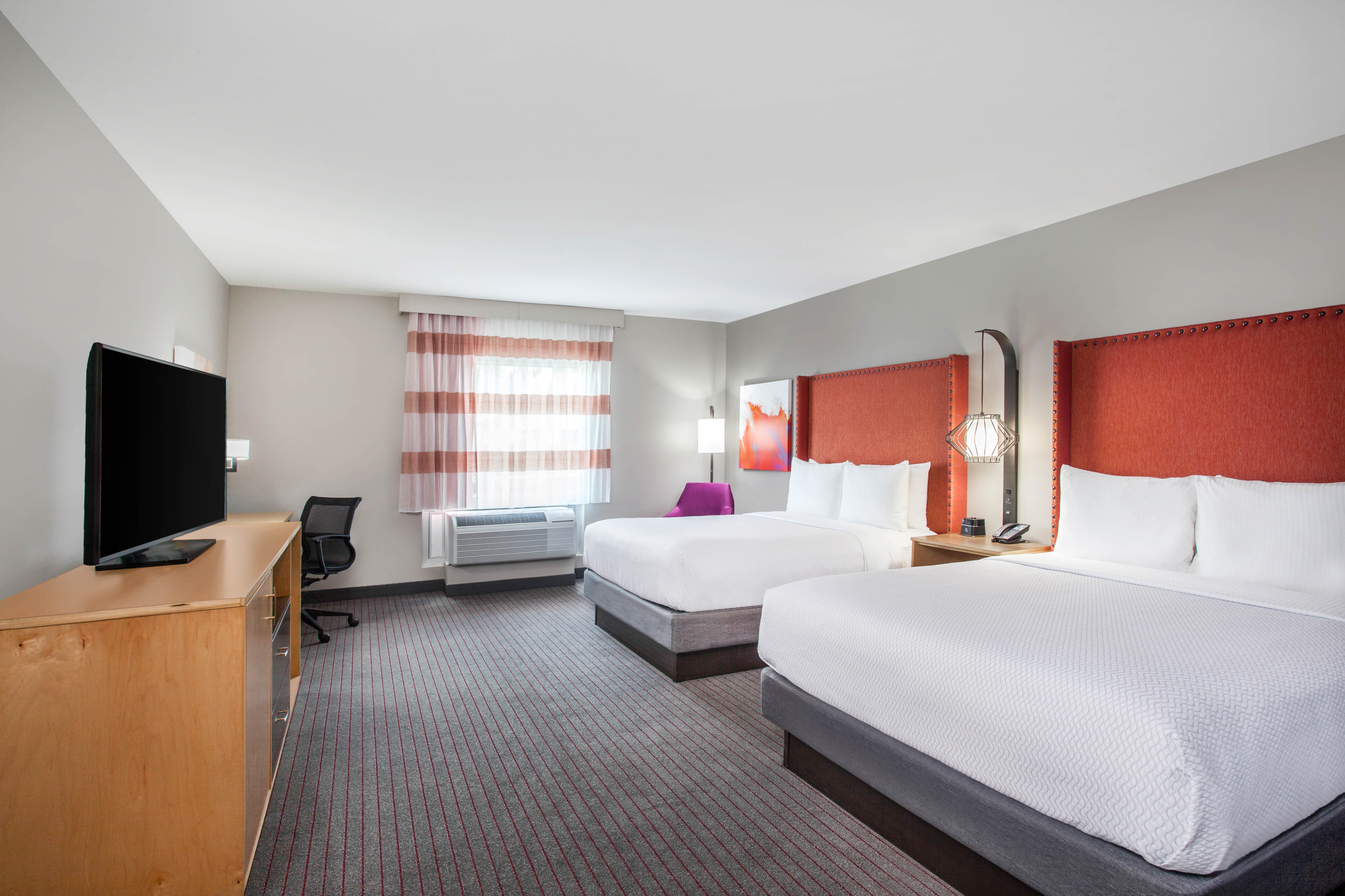 Guest room at the La Quinta Inn & Suites by Wyndham Madera in Madera, California