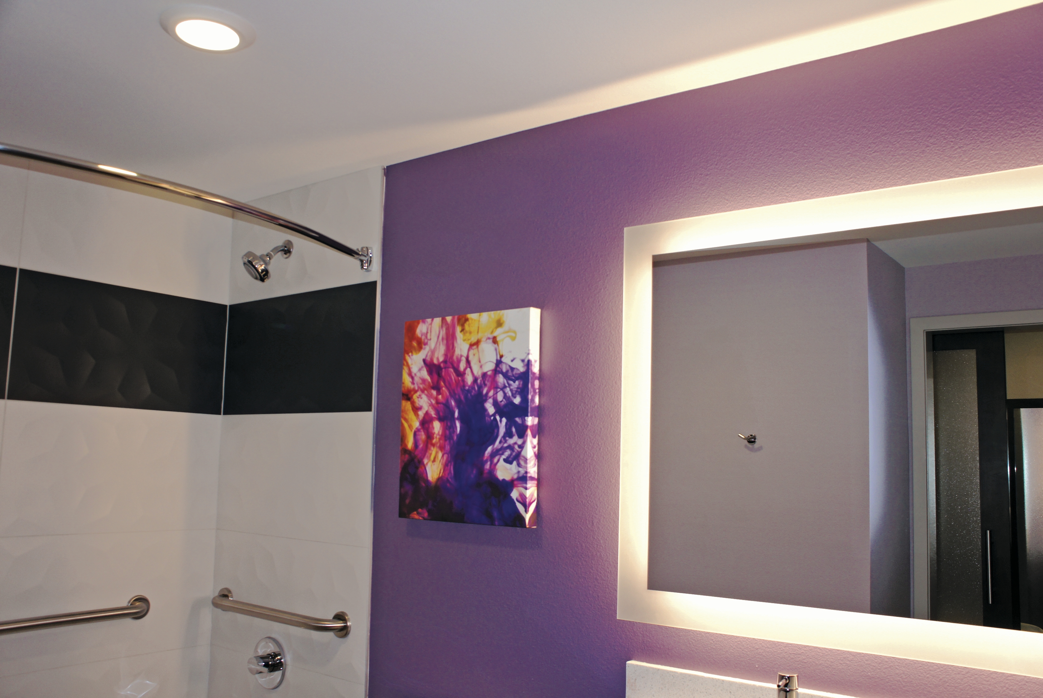 Guest room bath at the La Quinta Inn & Suites by Wyndham Madera in Madera, California