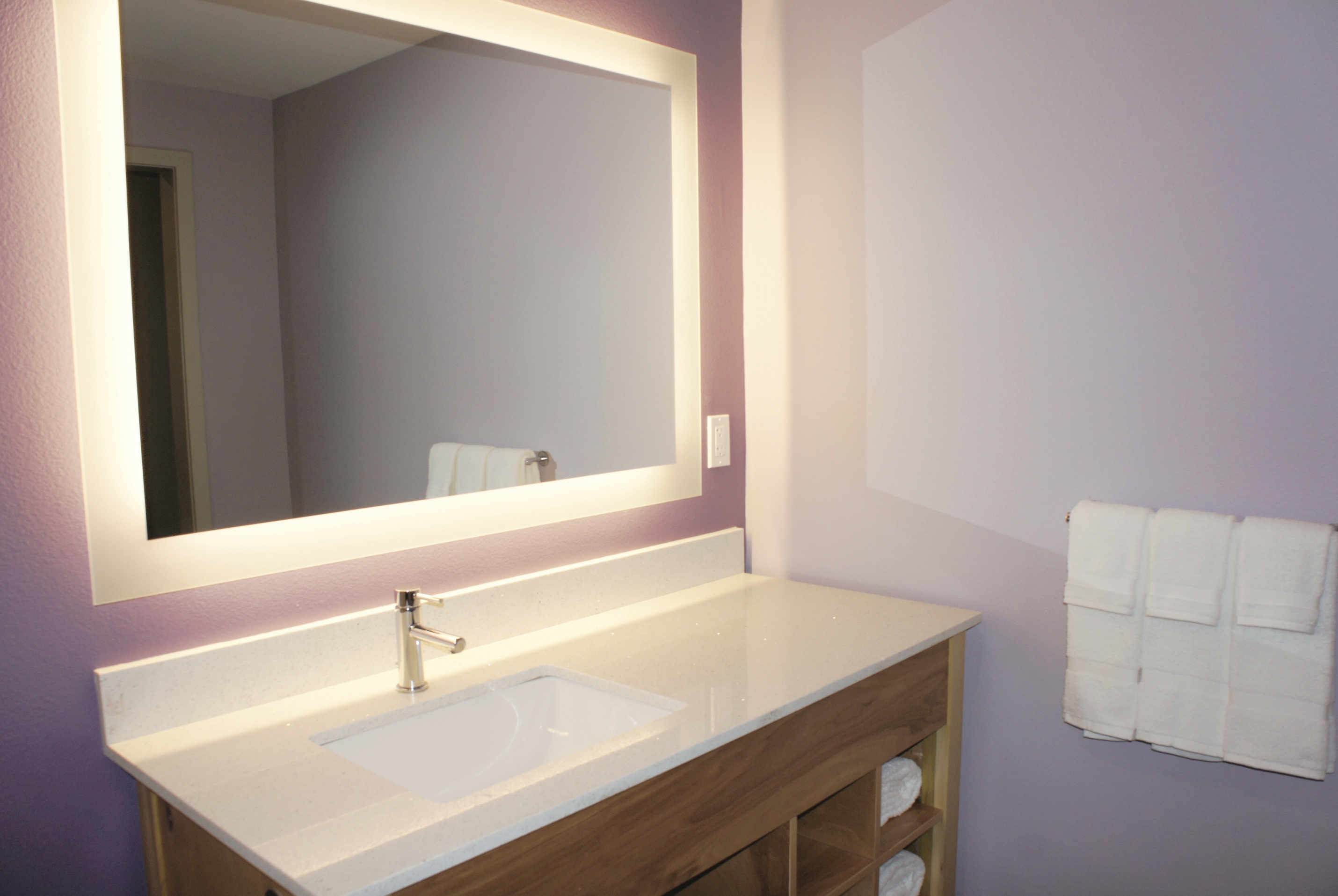 Guest room bath at the La Quinta Inn & Suites by Wyndham Madera in Madera, California