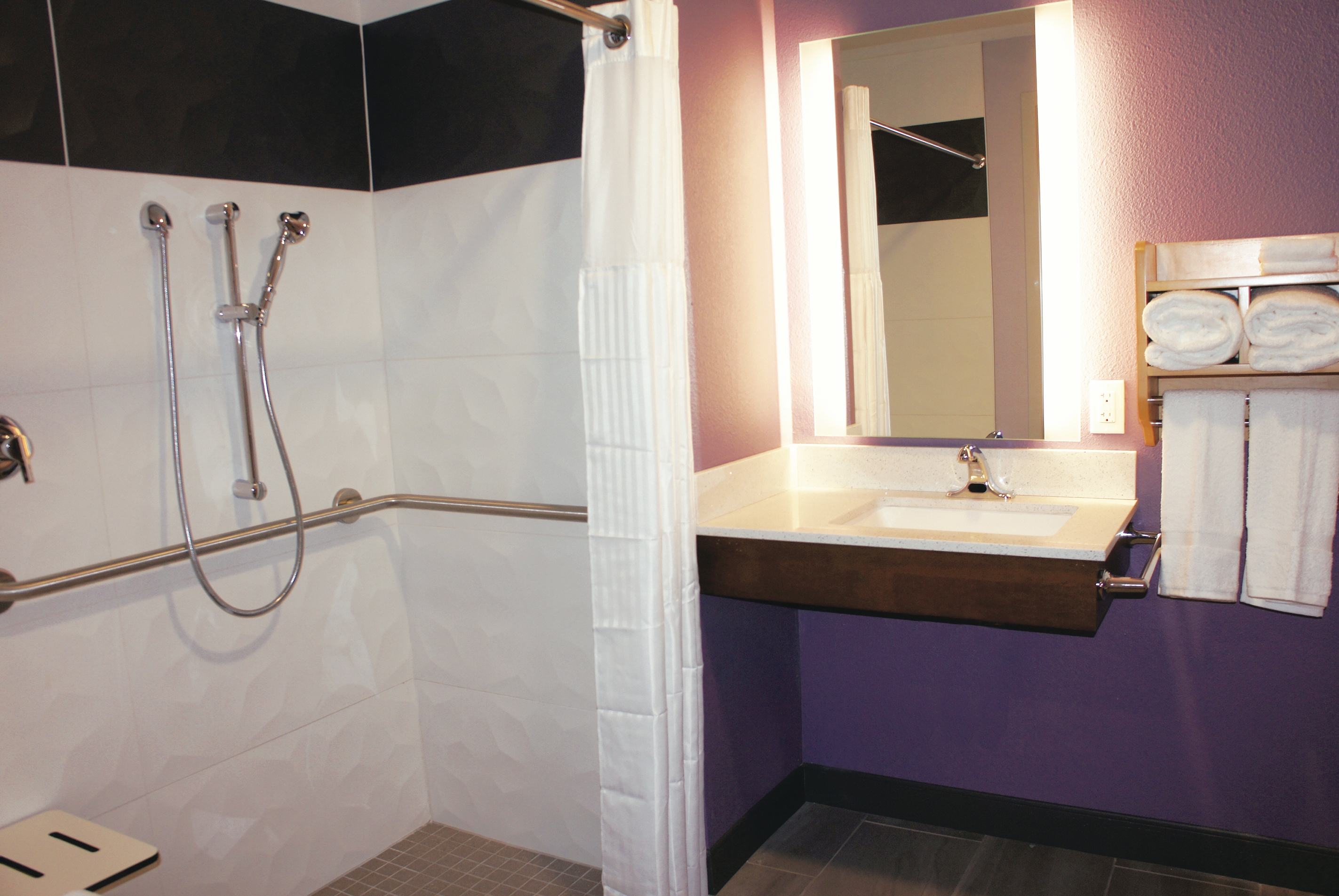 Guest room bath at the La Quinta Inn & Suites by Wyndham Madera in Madera, California