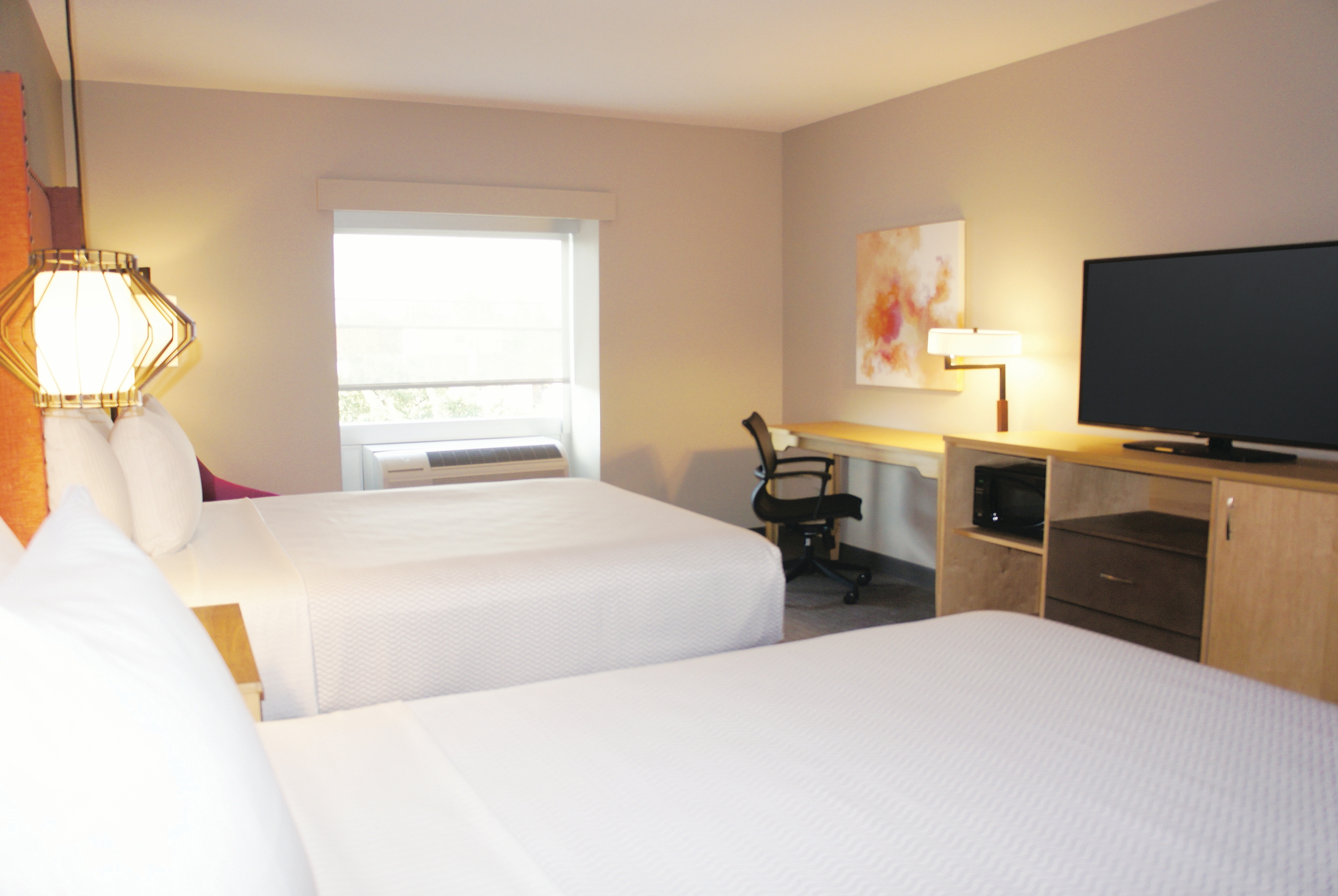 Guest room at the La Quinta Inn & Suites by Wyndham Madera in Madera, California