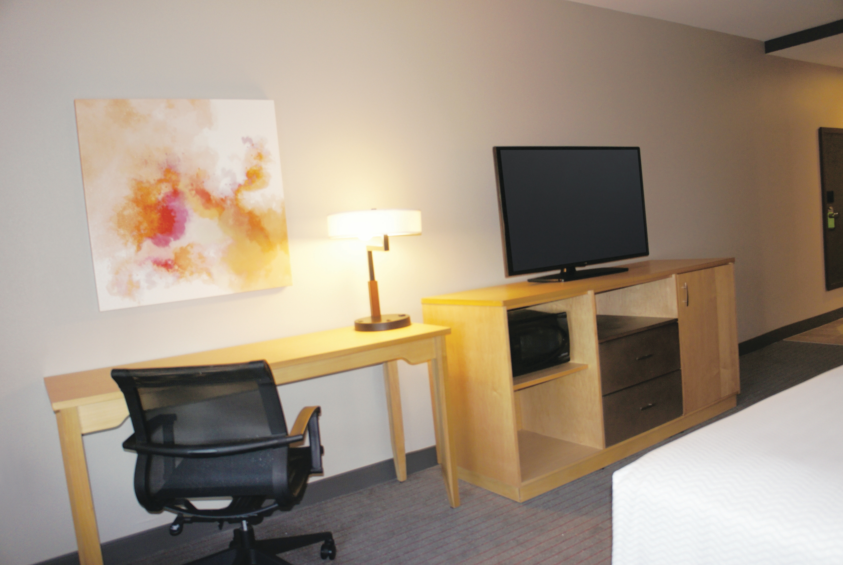 Guest room at the La Quinta Inn & Suites by Wyndham Madera in Madera, California