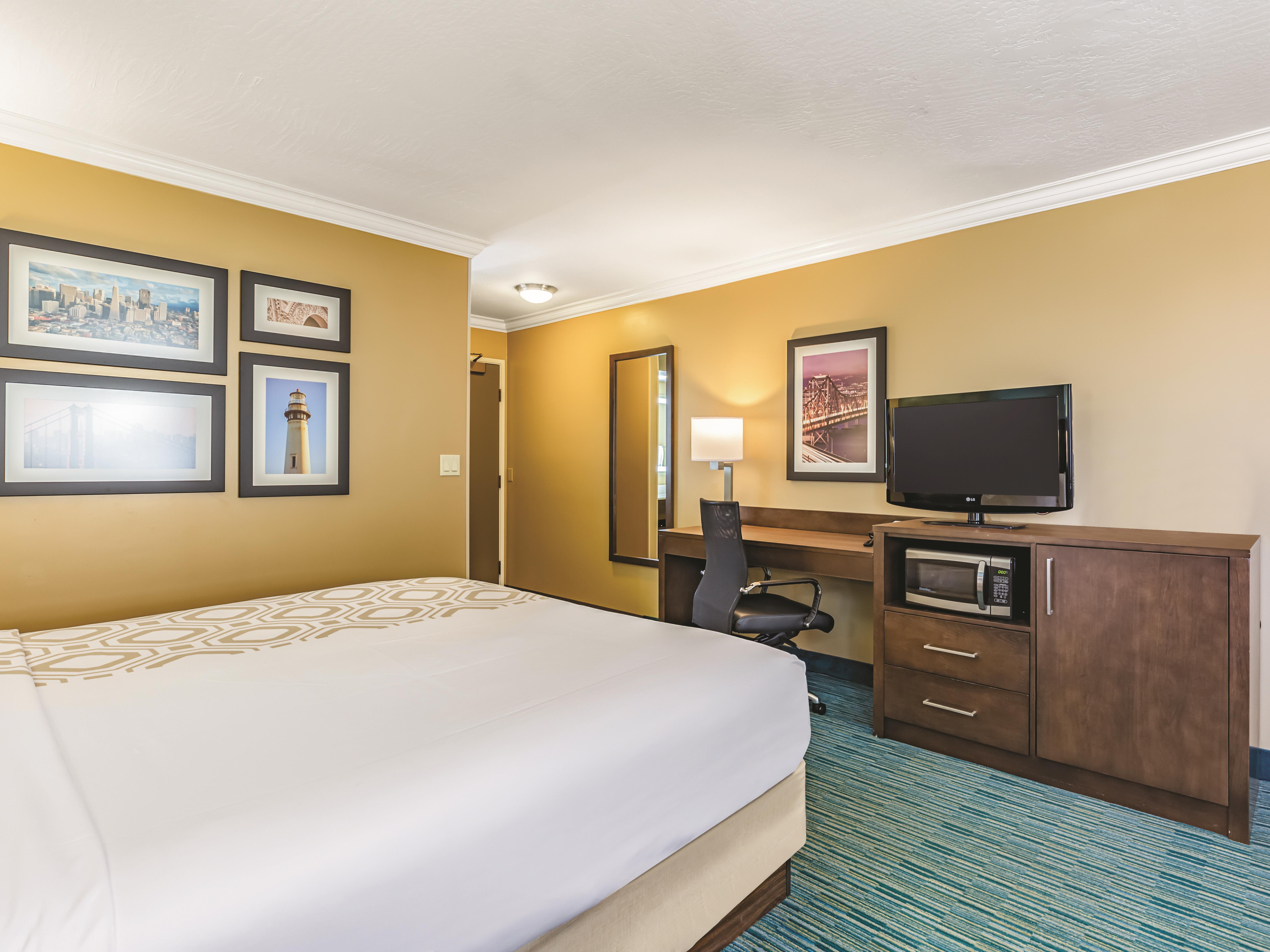 Guest room at the La Quinta Inn & Suites by Wyndham San Francisco Airport West in Millbrae, California