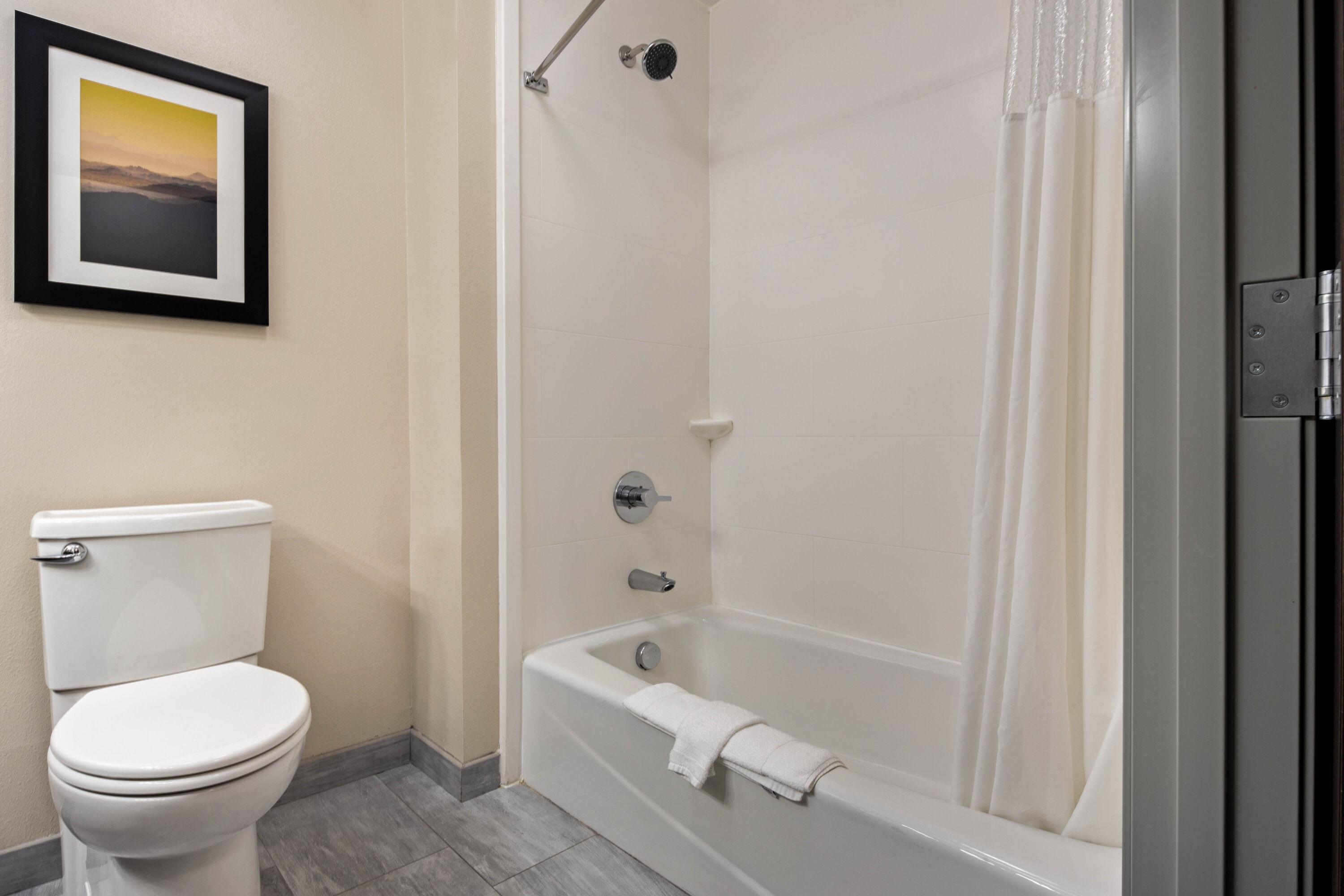 Guest room bath at the La Quinta Inn & Suites by Wyndham Morgan Hill-San Jose South in Morgan Hill, California