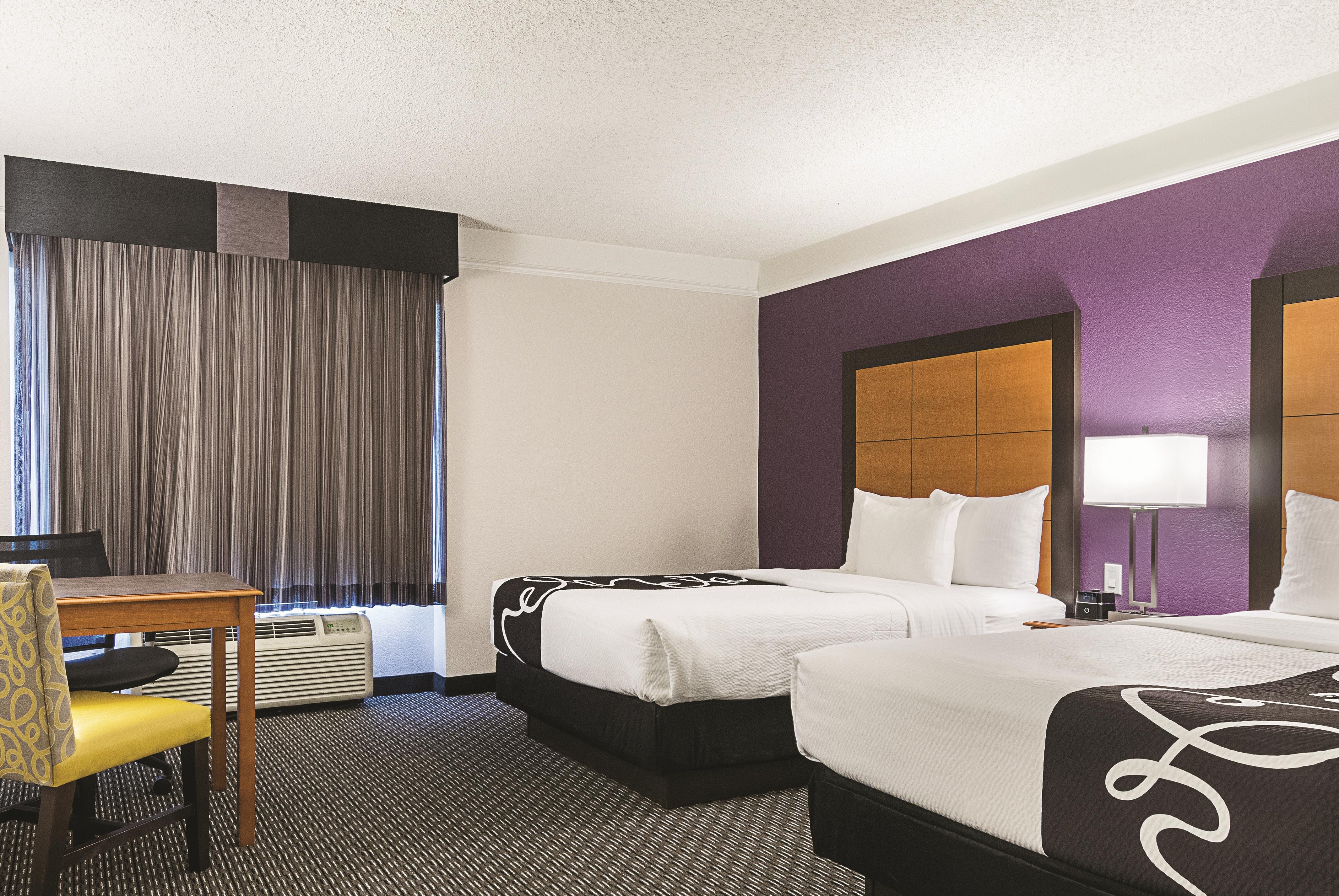 Guest room at the La Quinta Inn & Suites by Wyndham Ontario Airport in Ontario, California