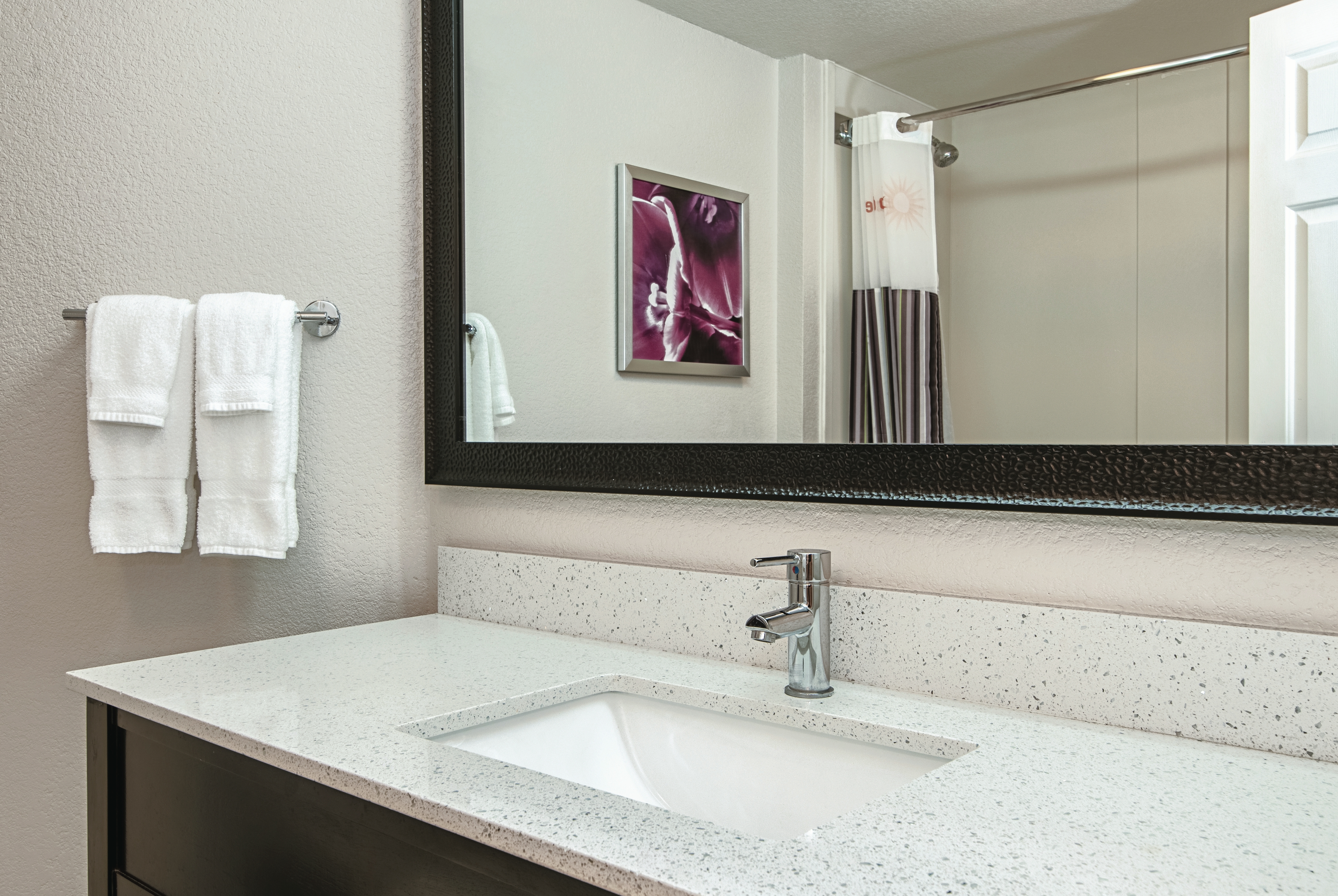 Guest room bath at the La Quinta Inn & Suites by Wyndham Ontario Airport in Ontario, California