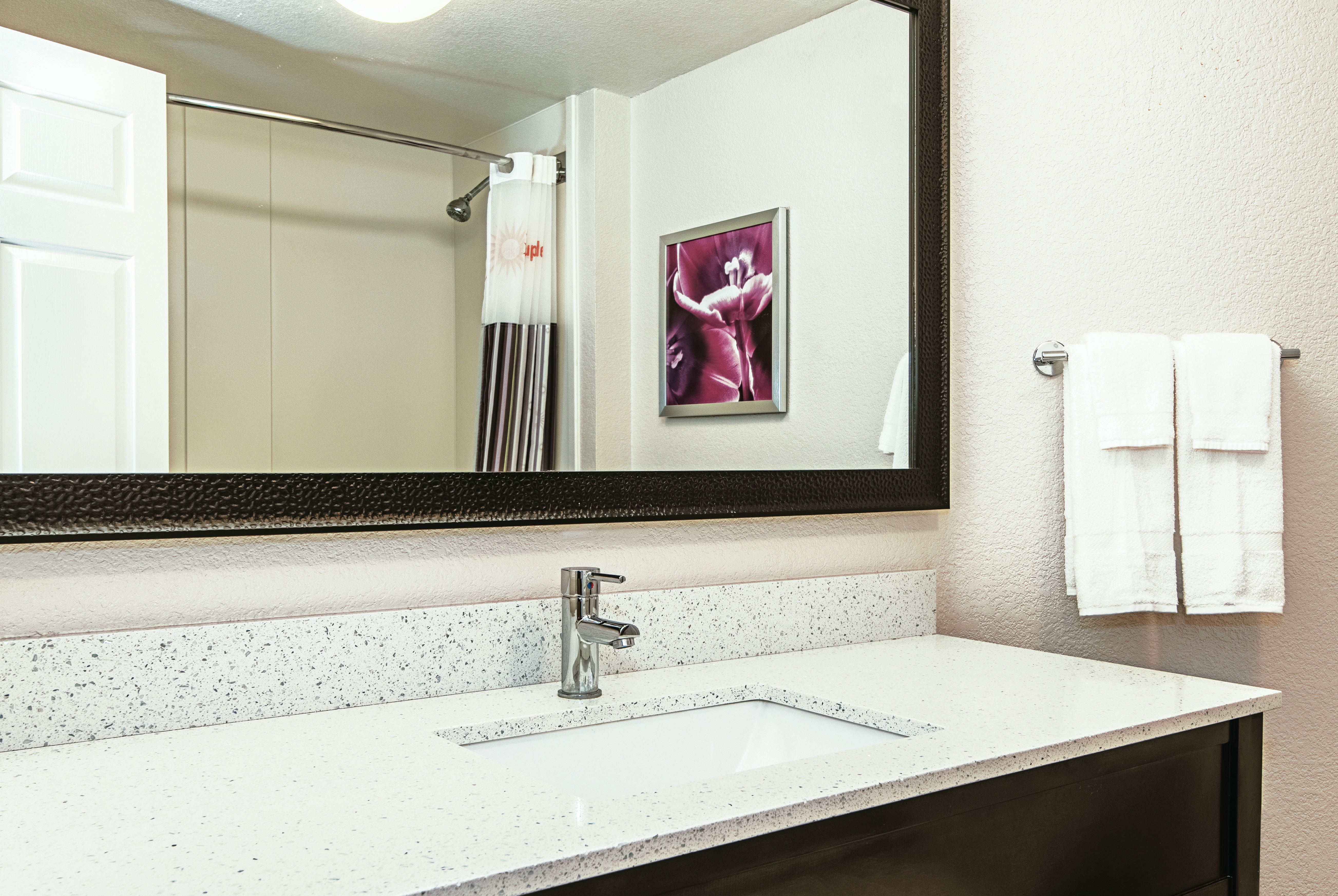 Guest room bath at the La Quinta Inn & Suites by Wyndham Ontario Airport in Ontario, California