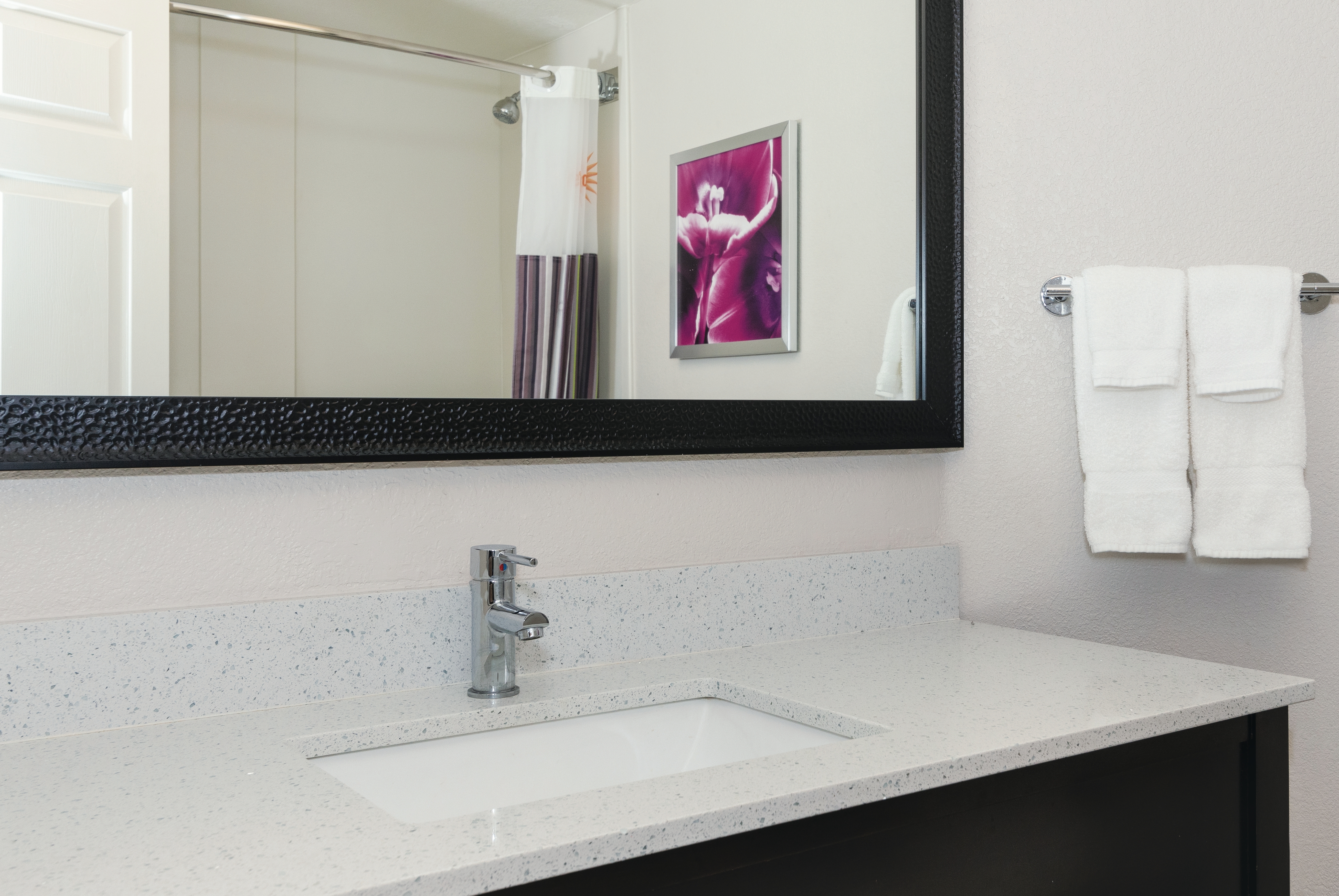Guest room bath at the La Quinta Inn & Suites by Wyndham Ontario Airport in Ontario, California