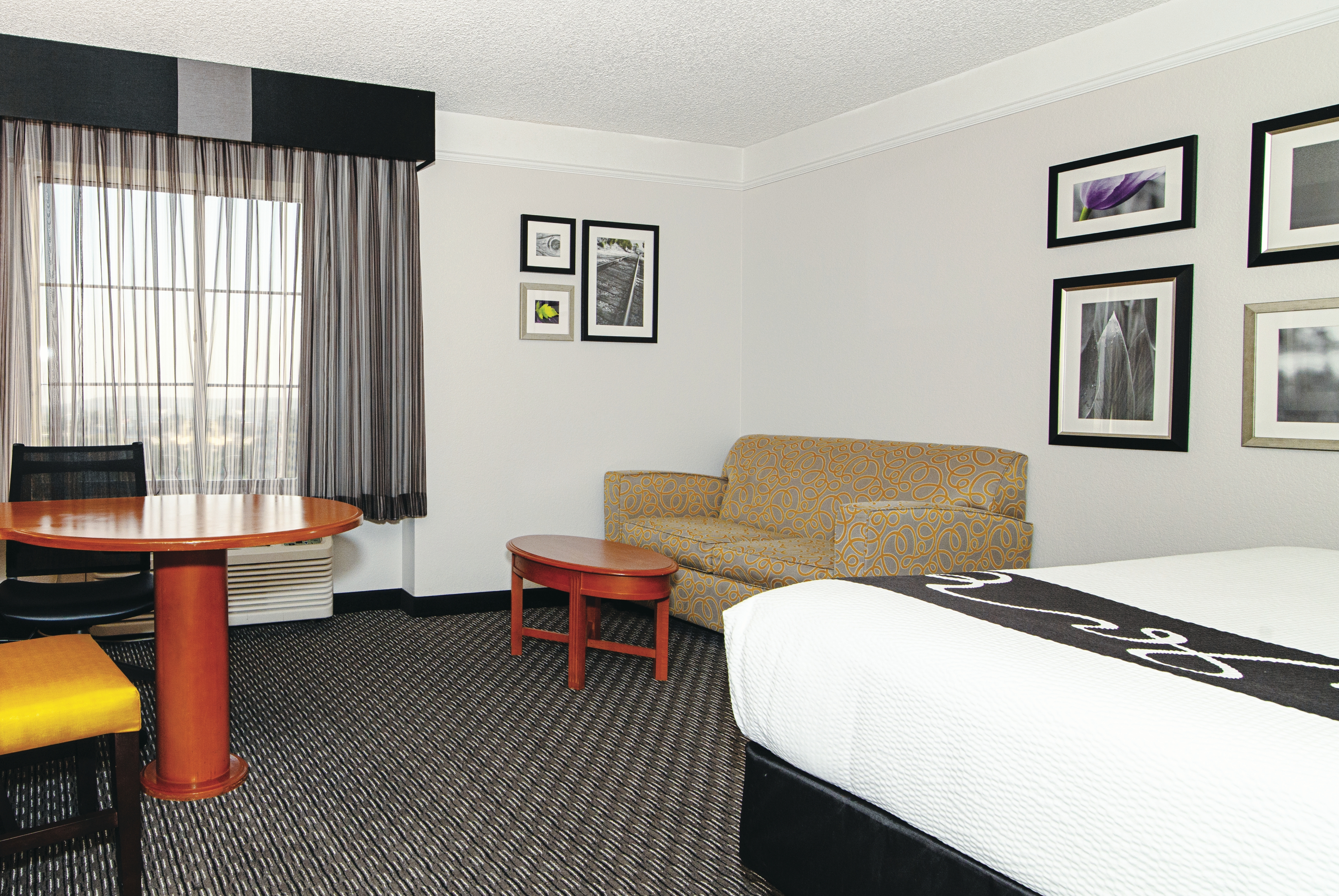 Guest room at the La Quinta Inn & Suites by Wyndham Ontario Airport in Ontario, California