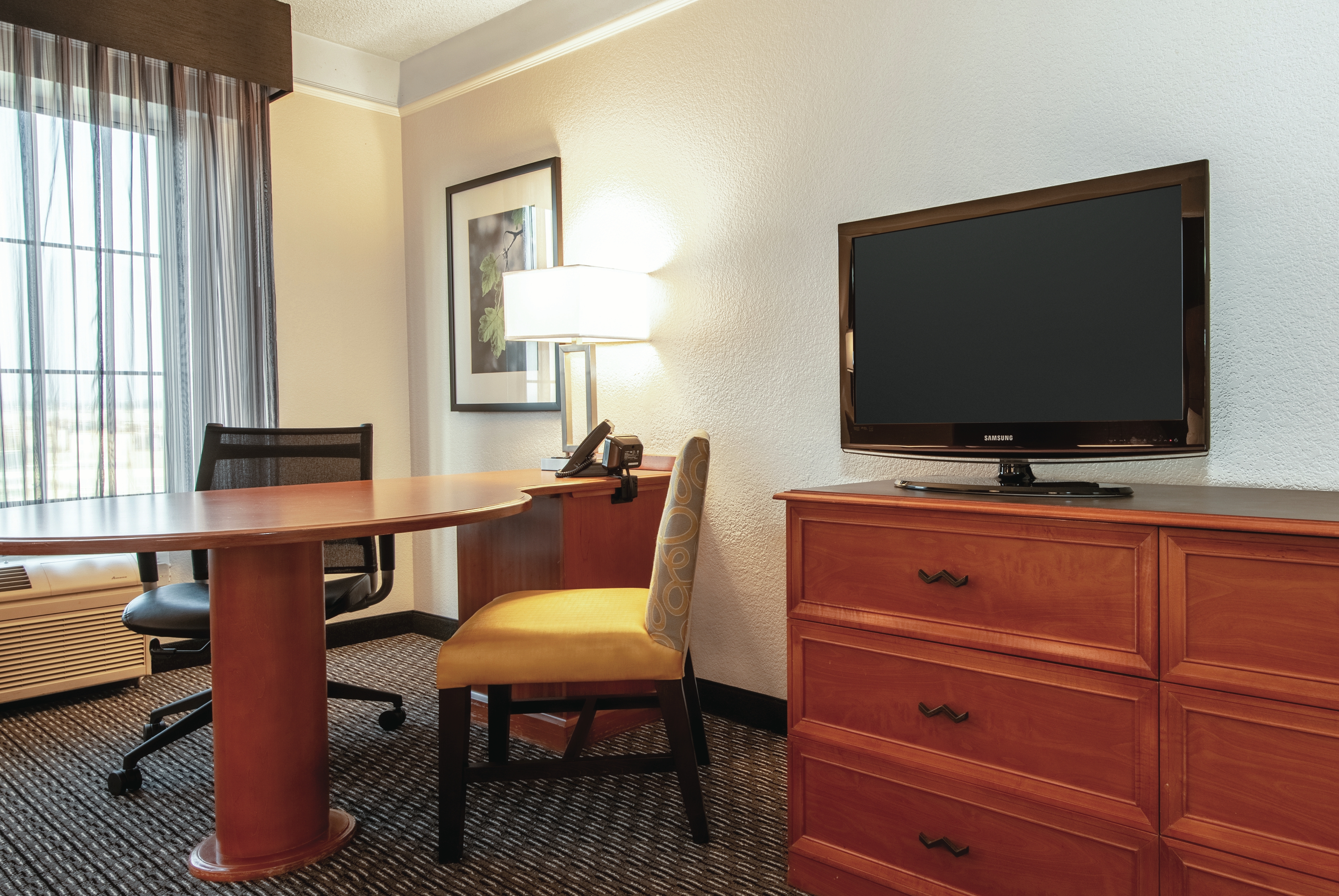 Guest room at the La Quinta Inn & Suites by Wyndham Ontario Airport in Ontario, California
