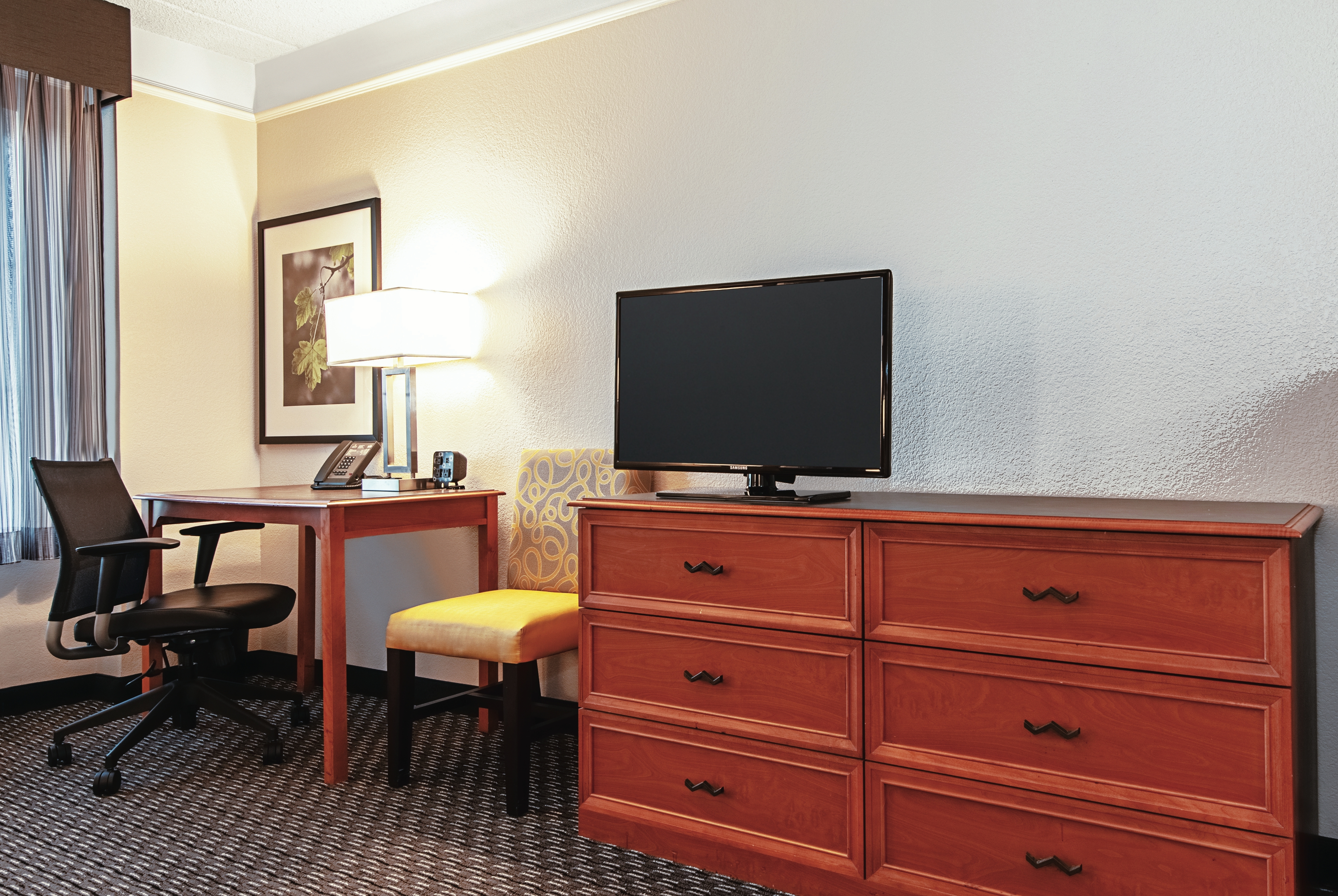 Guest room at the La Quinta Inn & Suites by Wyndham Ontario Airport in Ontario, California