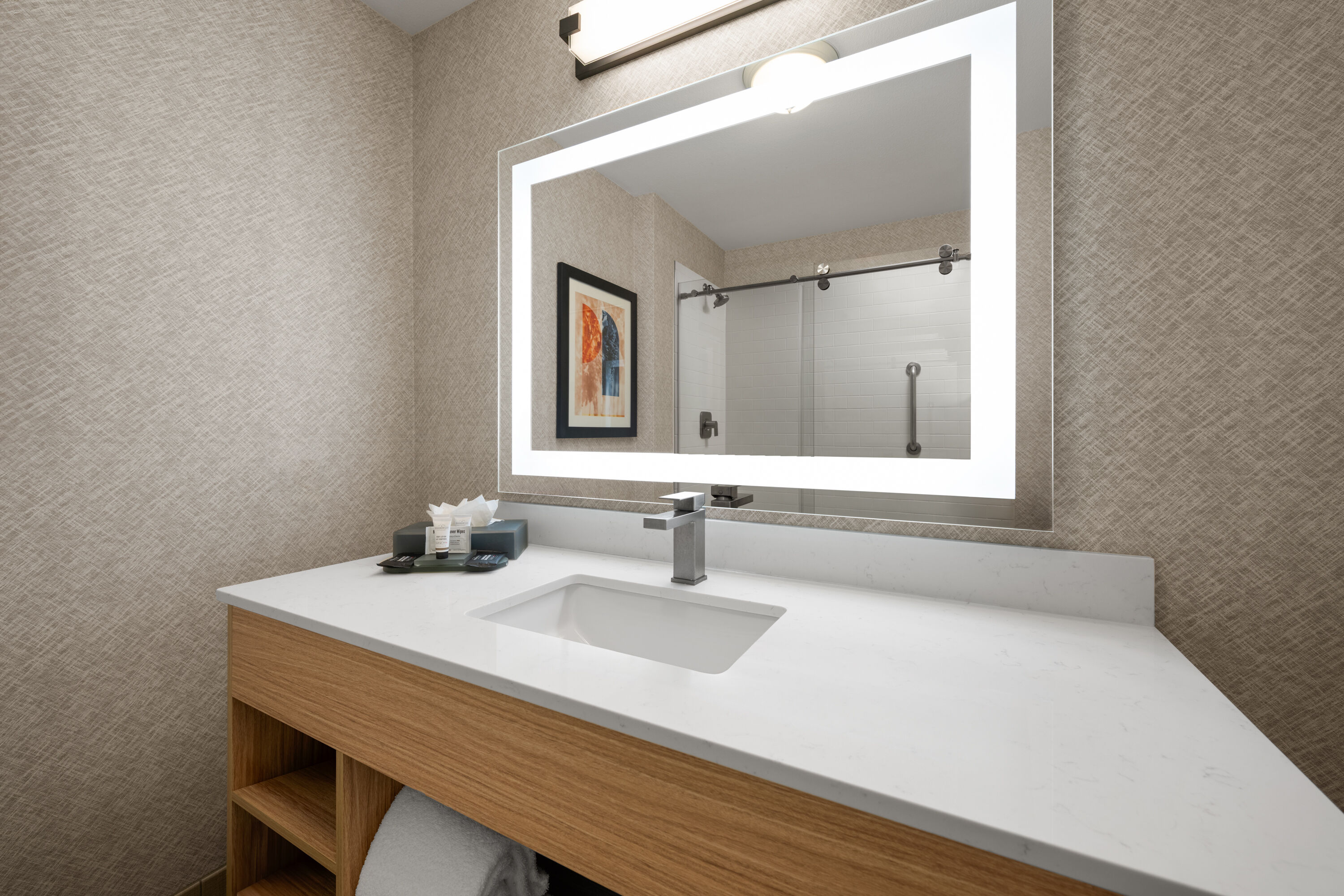 Guest room bath at the La Quinta Inn & Suites by Wyndham Paso Robles in Paso Robles, California