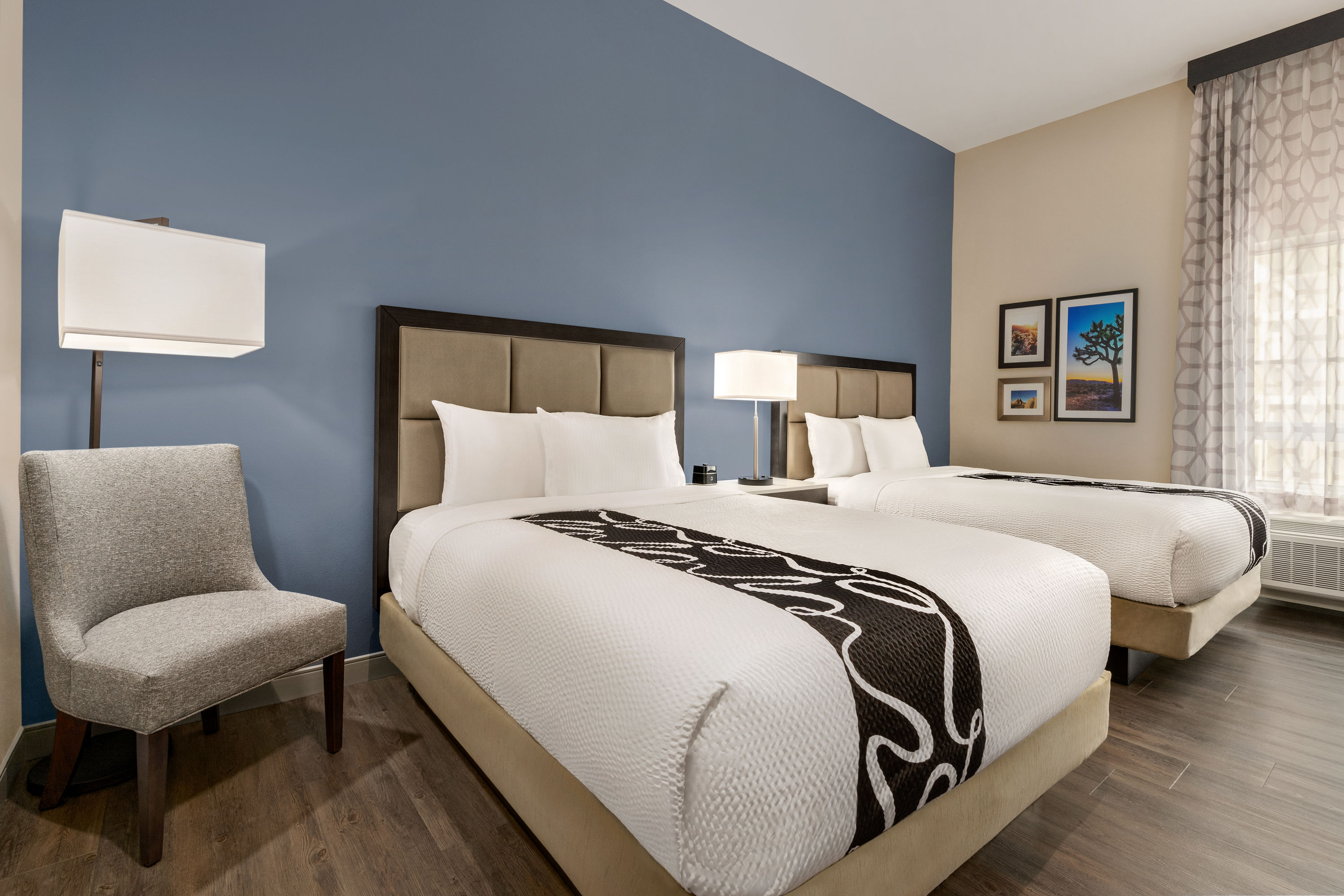 Guest room at the La Quinta Inn & Suites by Wyndham San Bernardino in San Bernardino, California