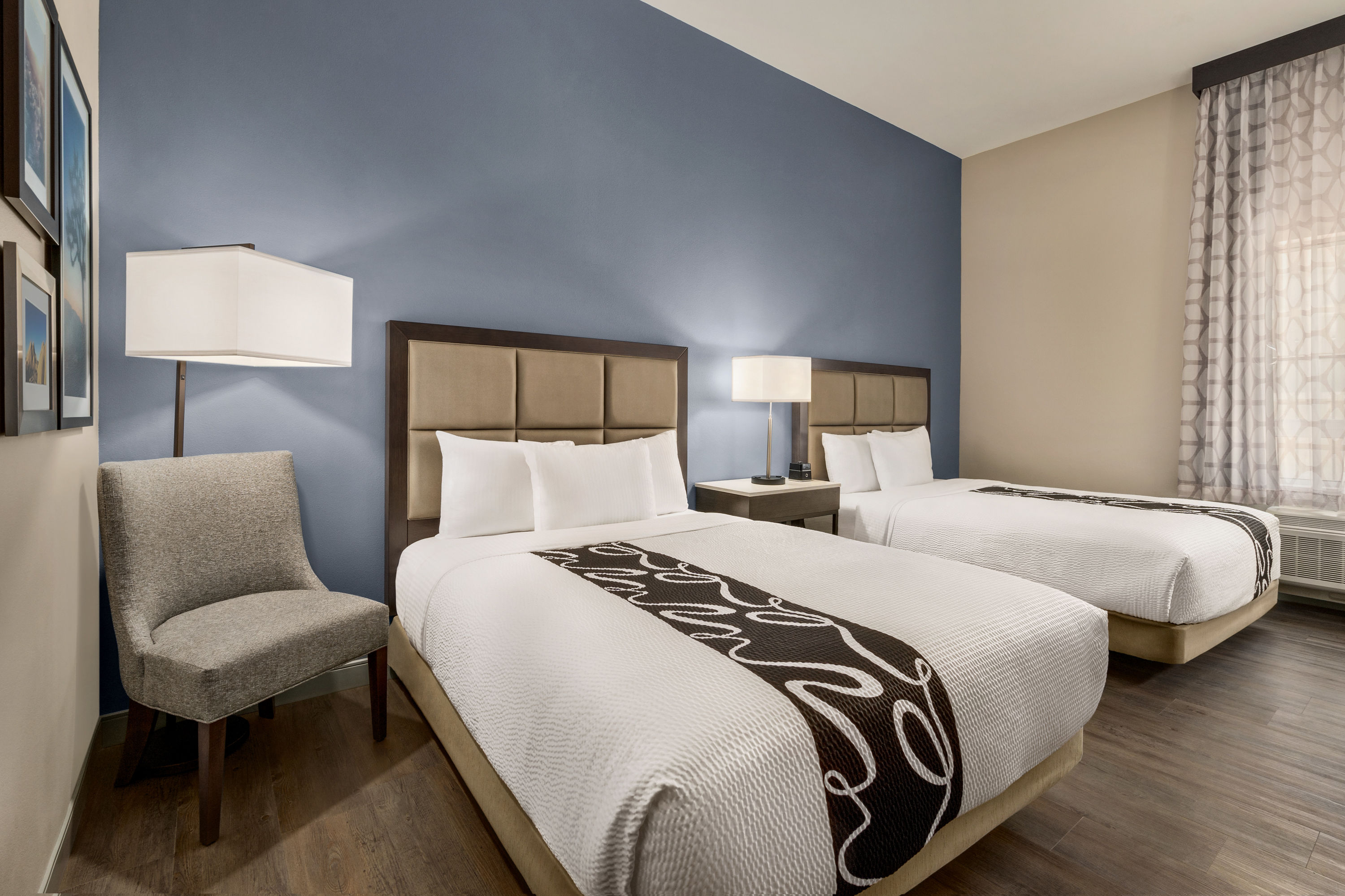 Guest room at the La Quinta Inn & Suites by Wyndham San Bernardino in San Bernardino, California