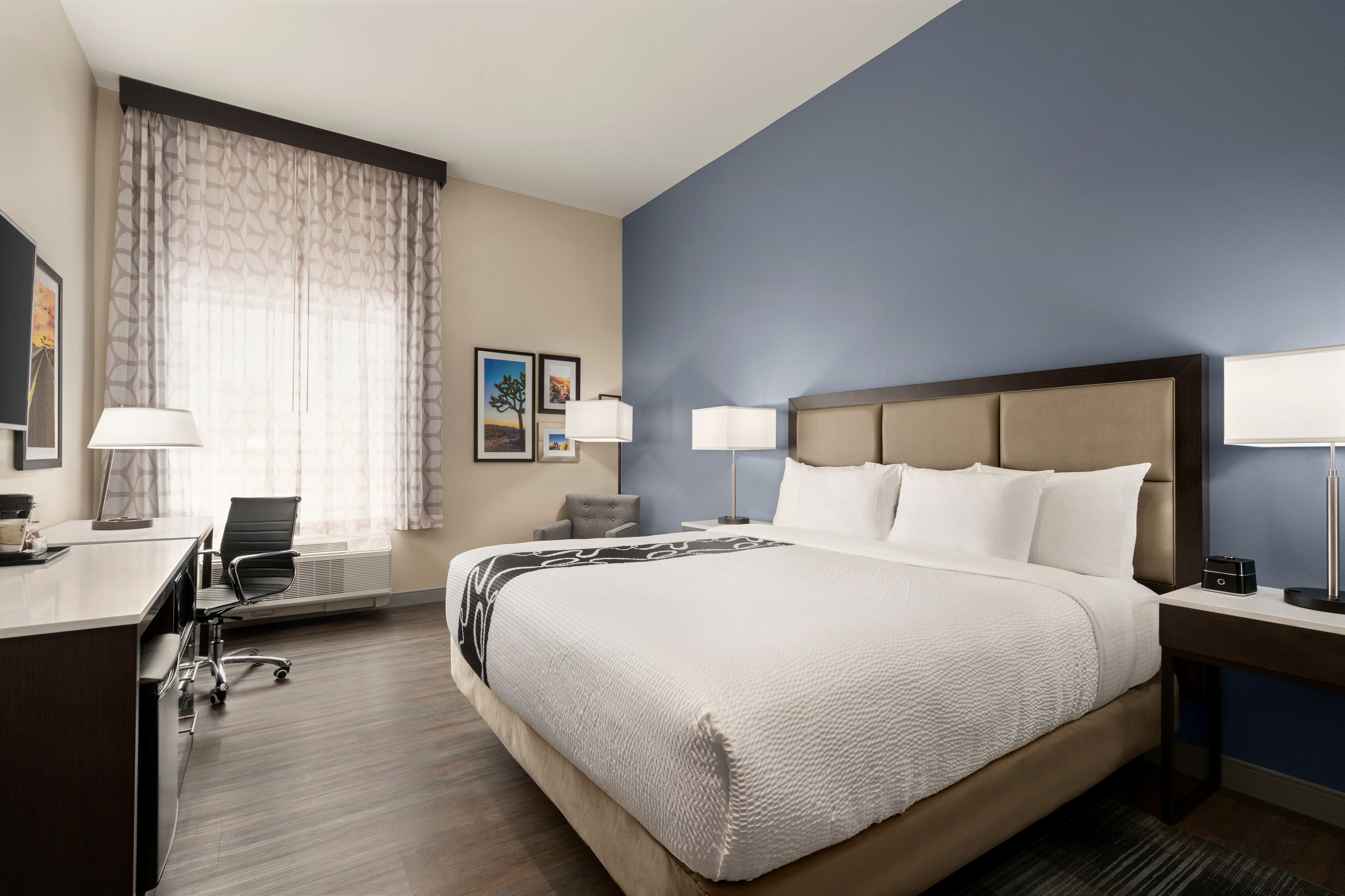 Guest room at the La Quinta Inn & Suites by Wyndham San Bernardino in San Bernardino, California
