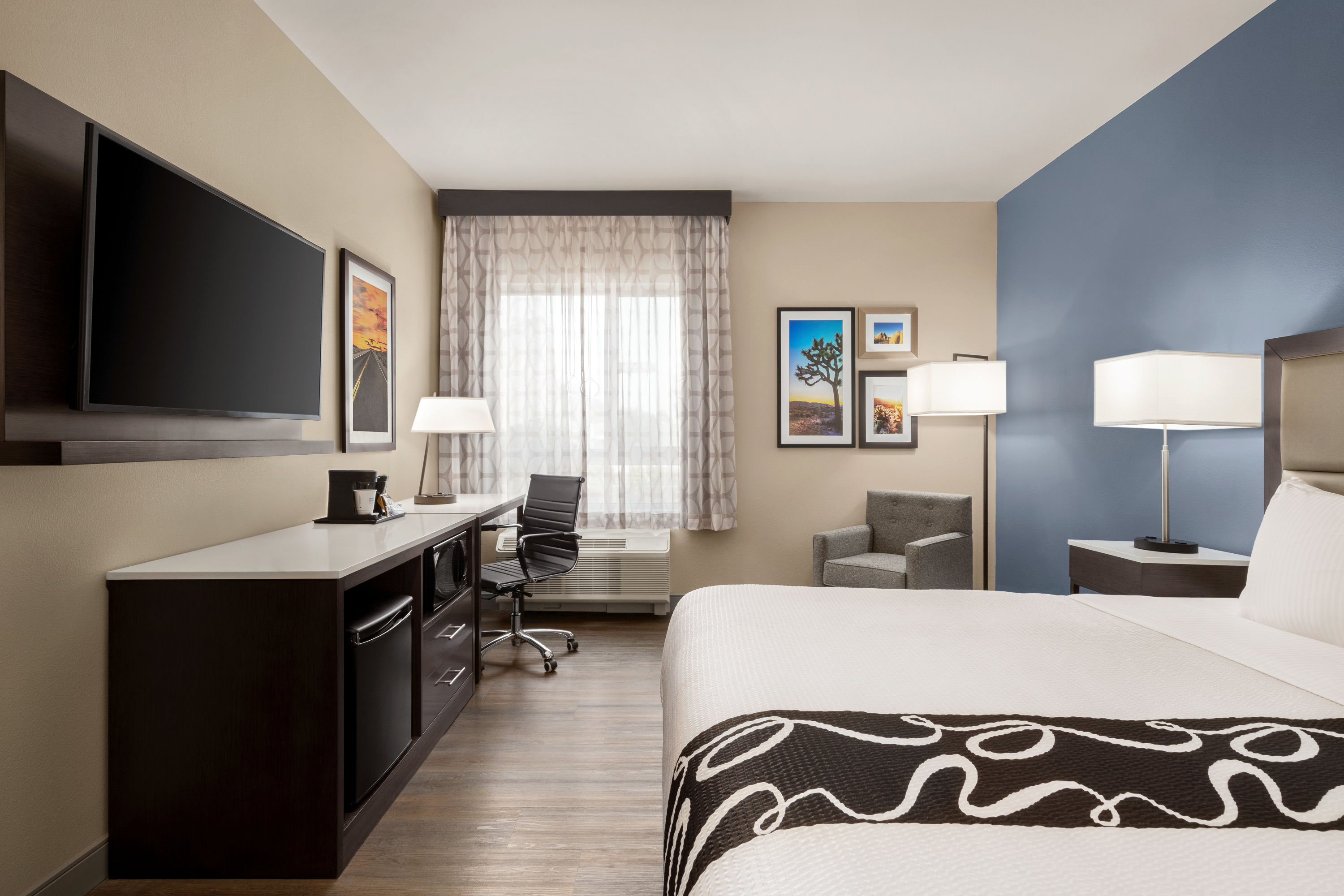 Guest room at the La Quinta Inn & Suites by Wyndham San Bernardino in San Bernardino, California
