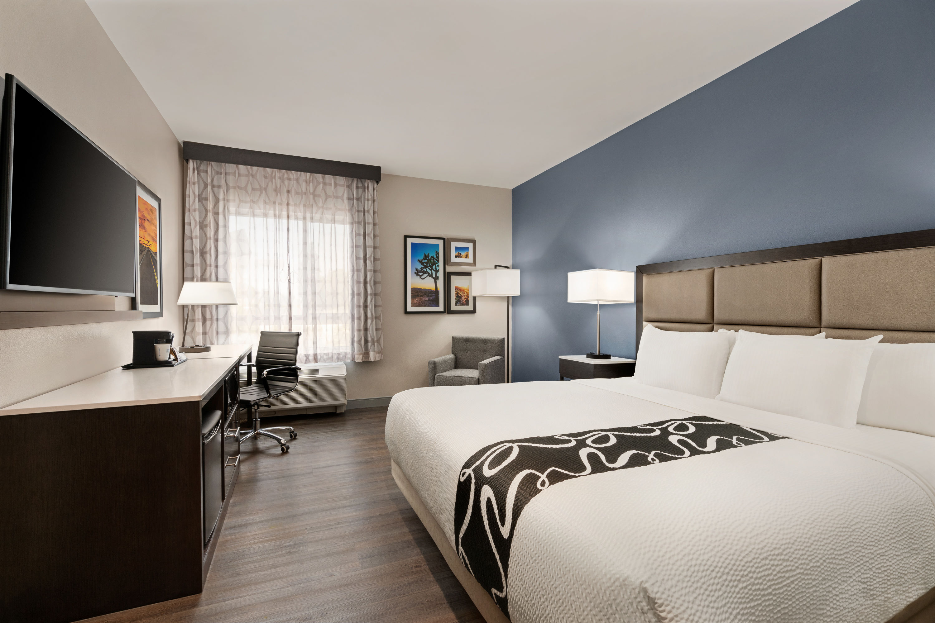 Guest room at the La Quinta Inn & Suites by Wyndham San Bernardino in San Bernardino, California