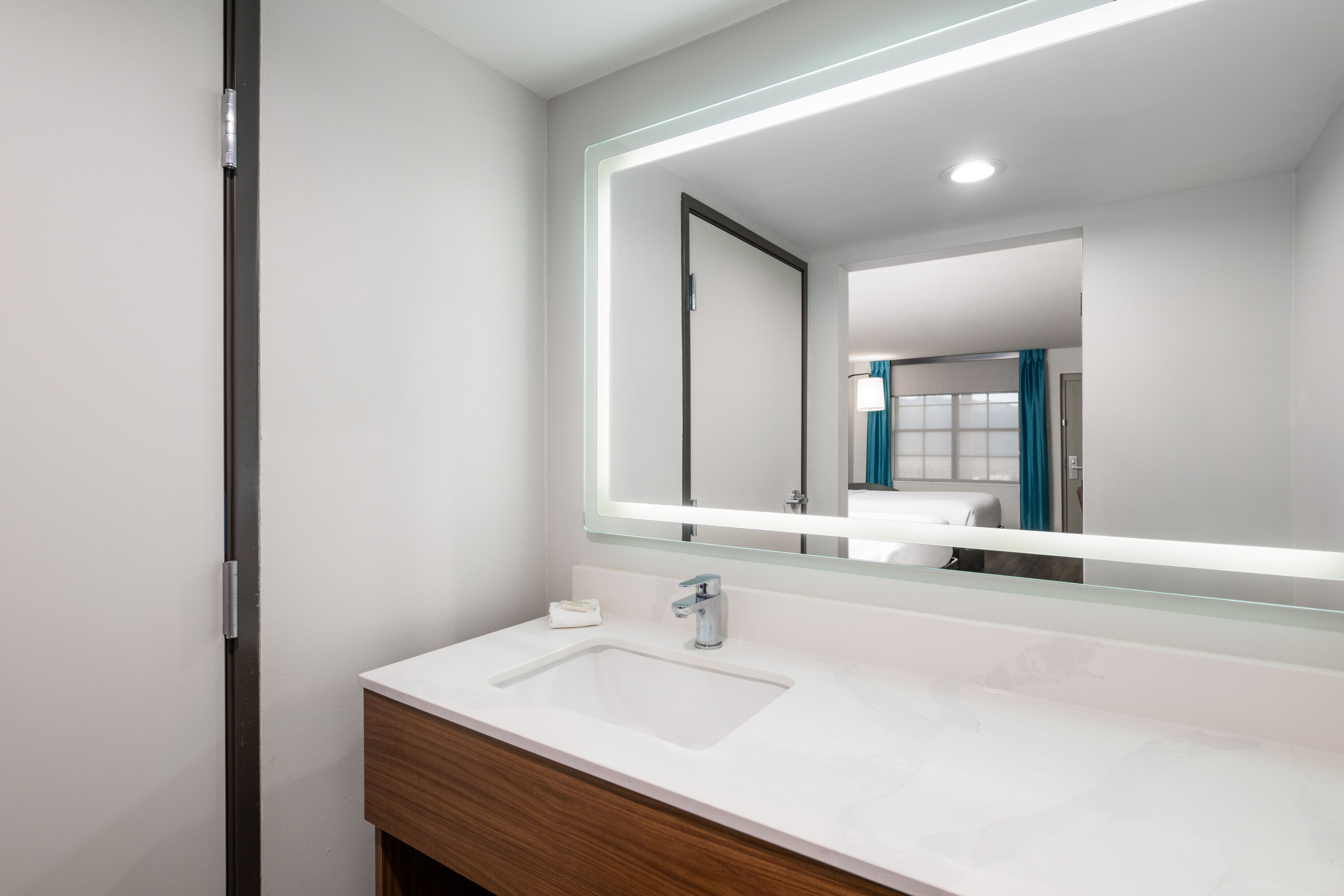 Guest room bath at the La Quinta Inn by Wyndham San Diego - Miramar in San Diego, California