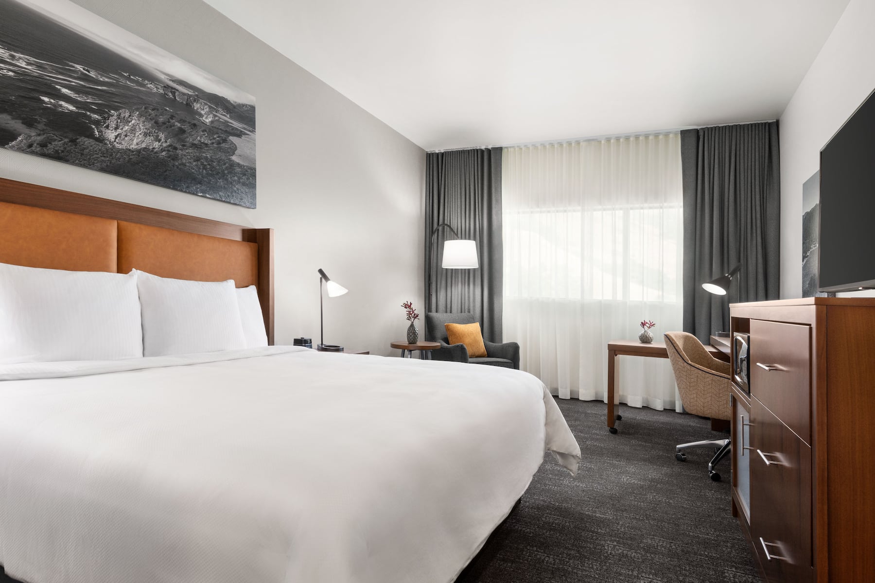 Guest room at the La Quinta Inn & Suites by Wyndham San Luis Obispo Downtown in San Luis Obispo, California