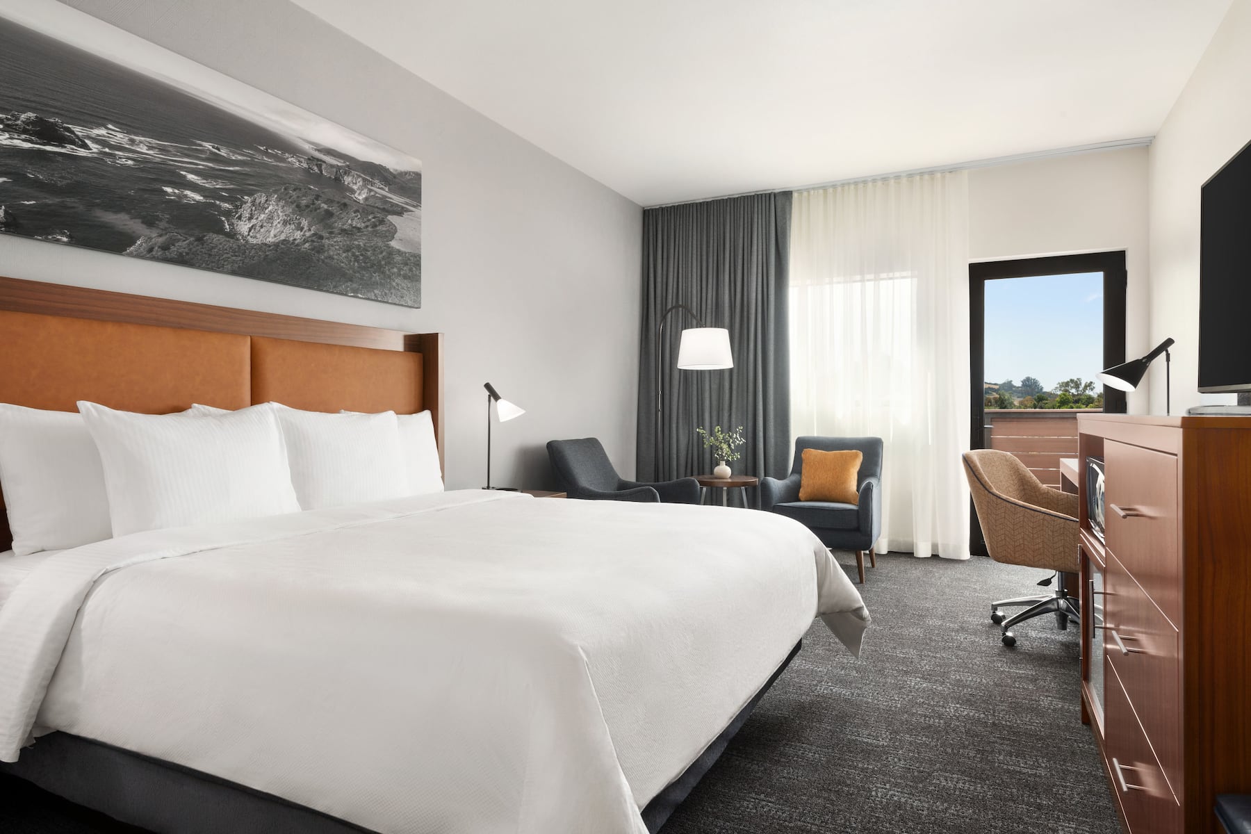 Guest room at the La Quinta Inn & Suites by Wyndham San Luis Obispo Downtown in San Luis Obispo, California