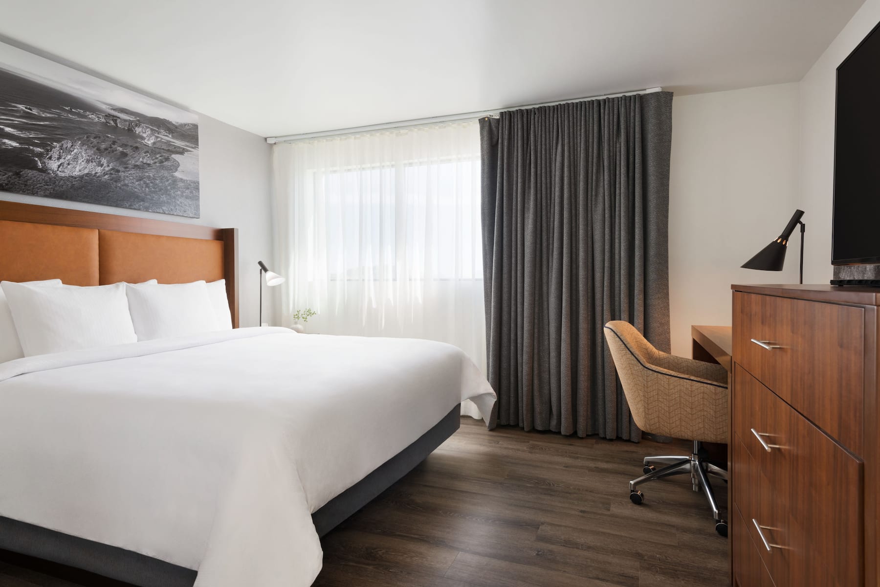 Guest room at the La Quinta Inn & Suites by Wyndham San Luis Obispo Downtown in San Luis Obispo, California