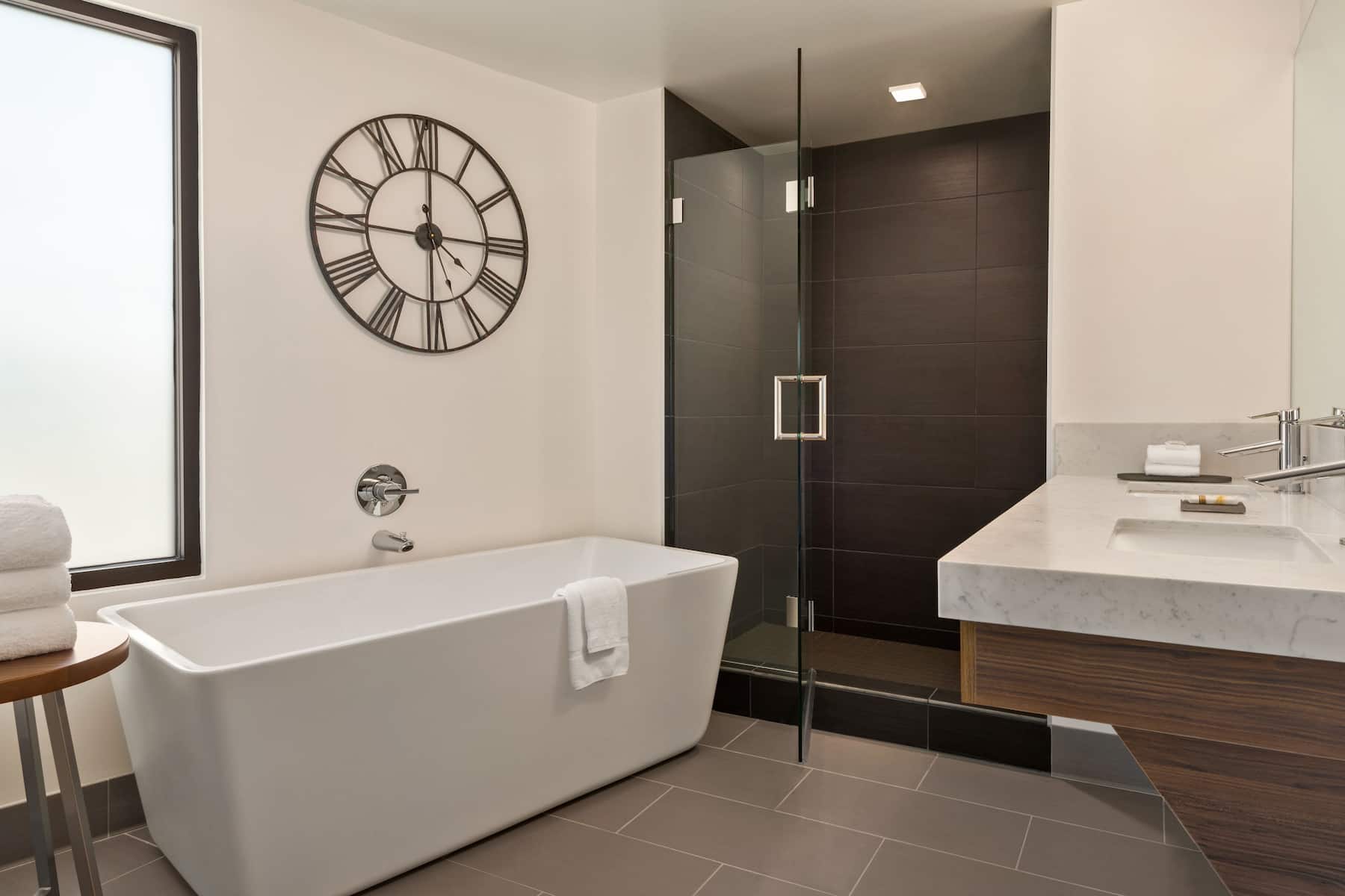 Guest room bath at the La Quinta Inn & Suites by Wyndham San Luis Obispo Downtown in San Luis Obispo, California