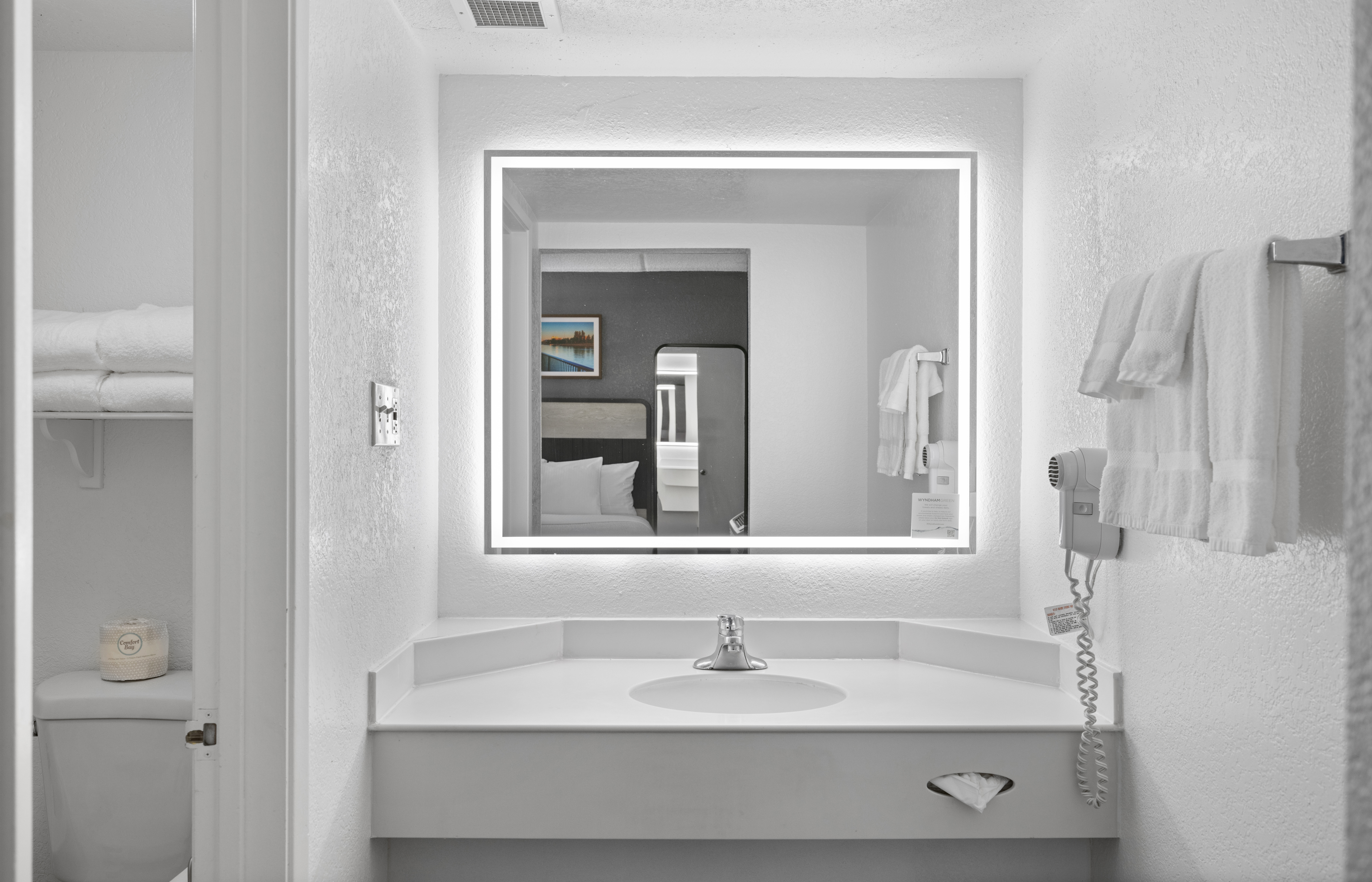 Guest room bath at the La Quinta Inn by Wyndham Stockton in Stockton, California