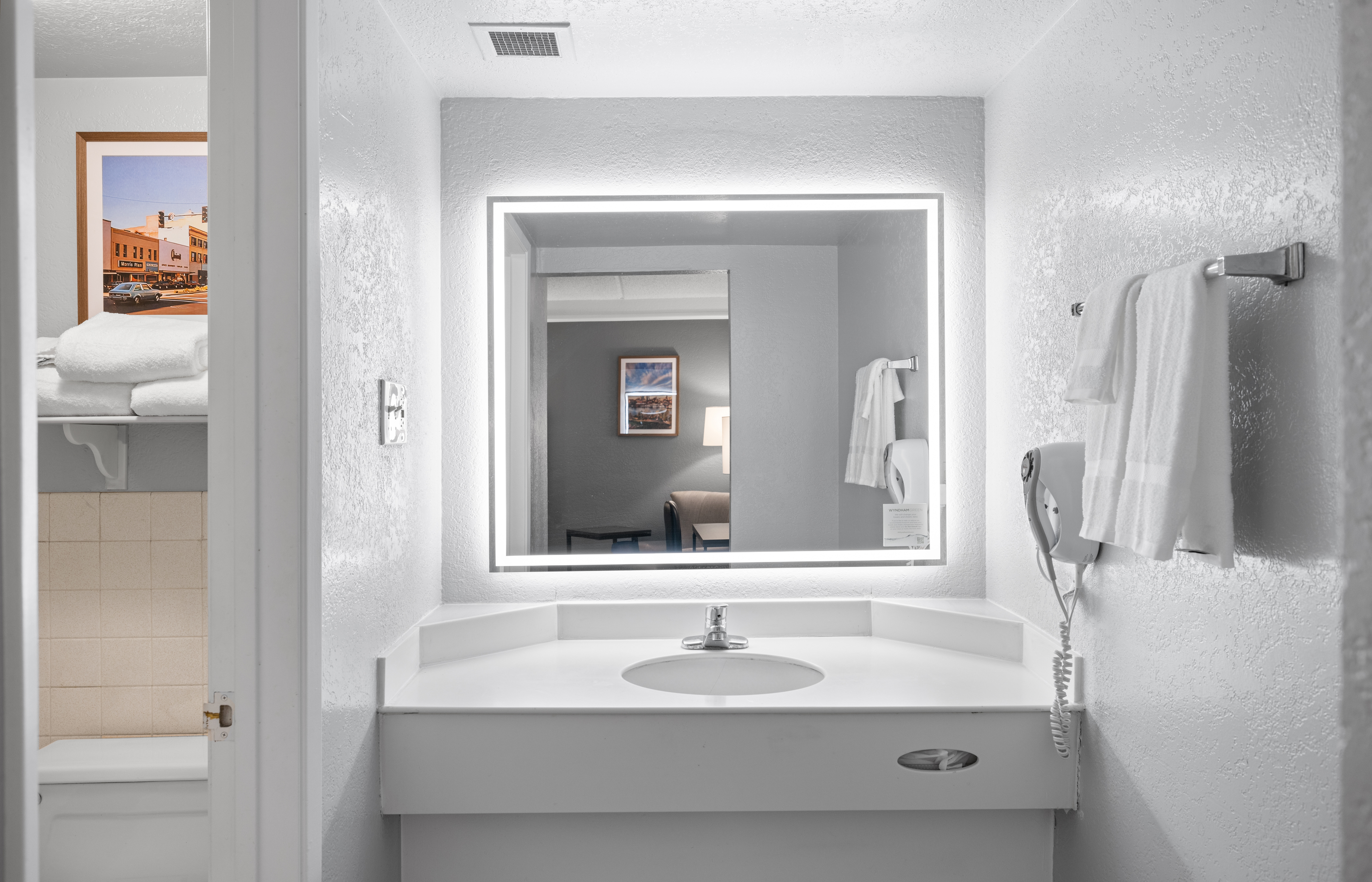 Guest room bath at the La Quinta Inn by Wyndham Stockton in Stockton, California