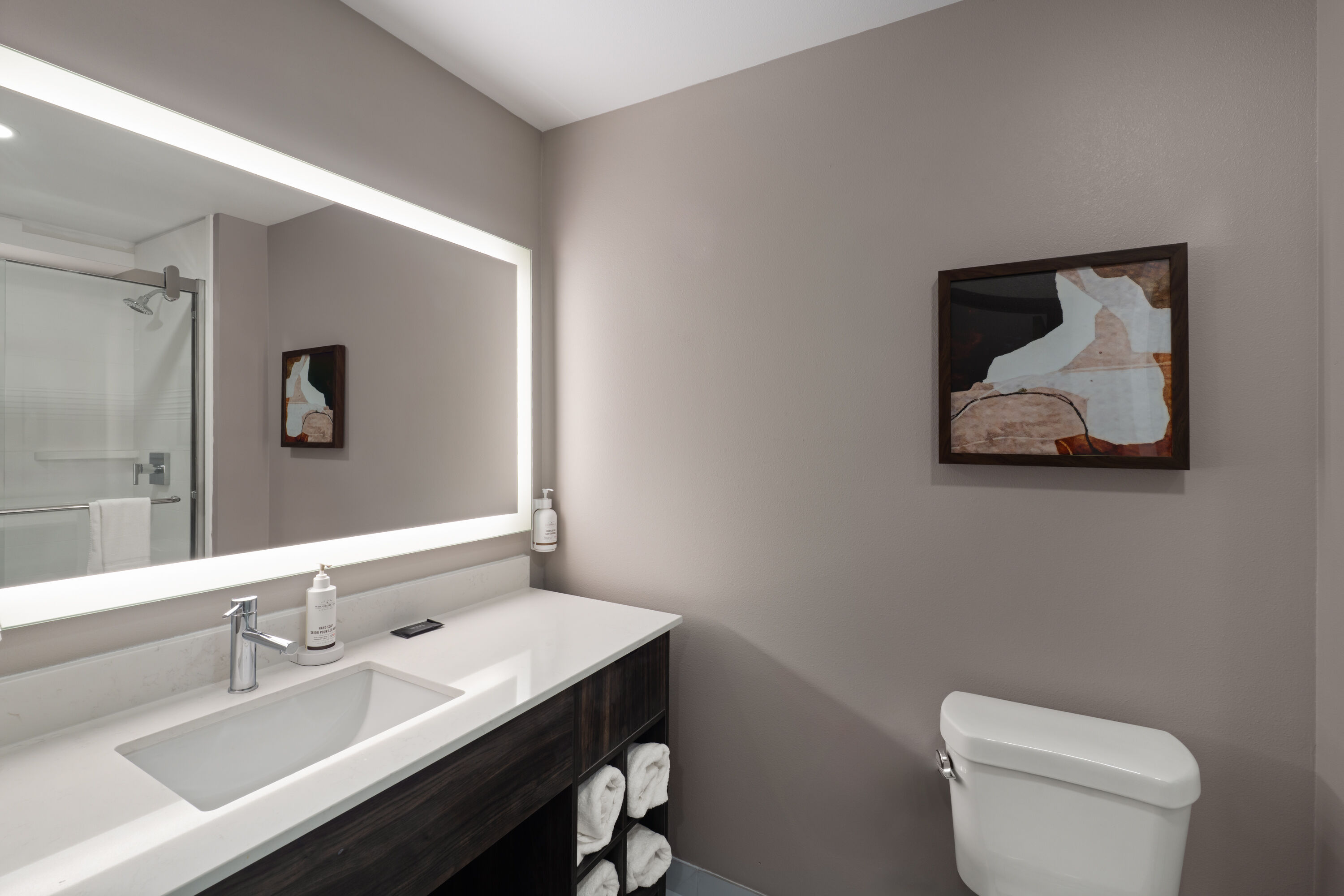 Guest room bath at the La Quinta Inn & Suites by Wyndham Tracy in Tracy, California