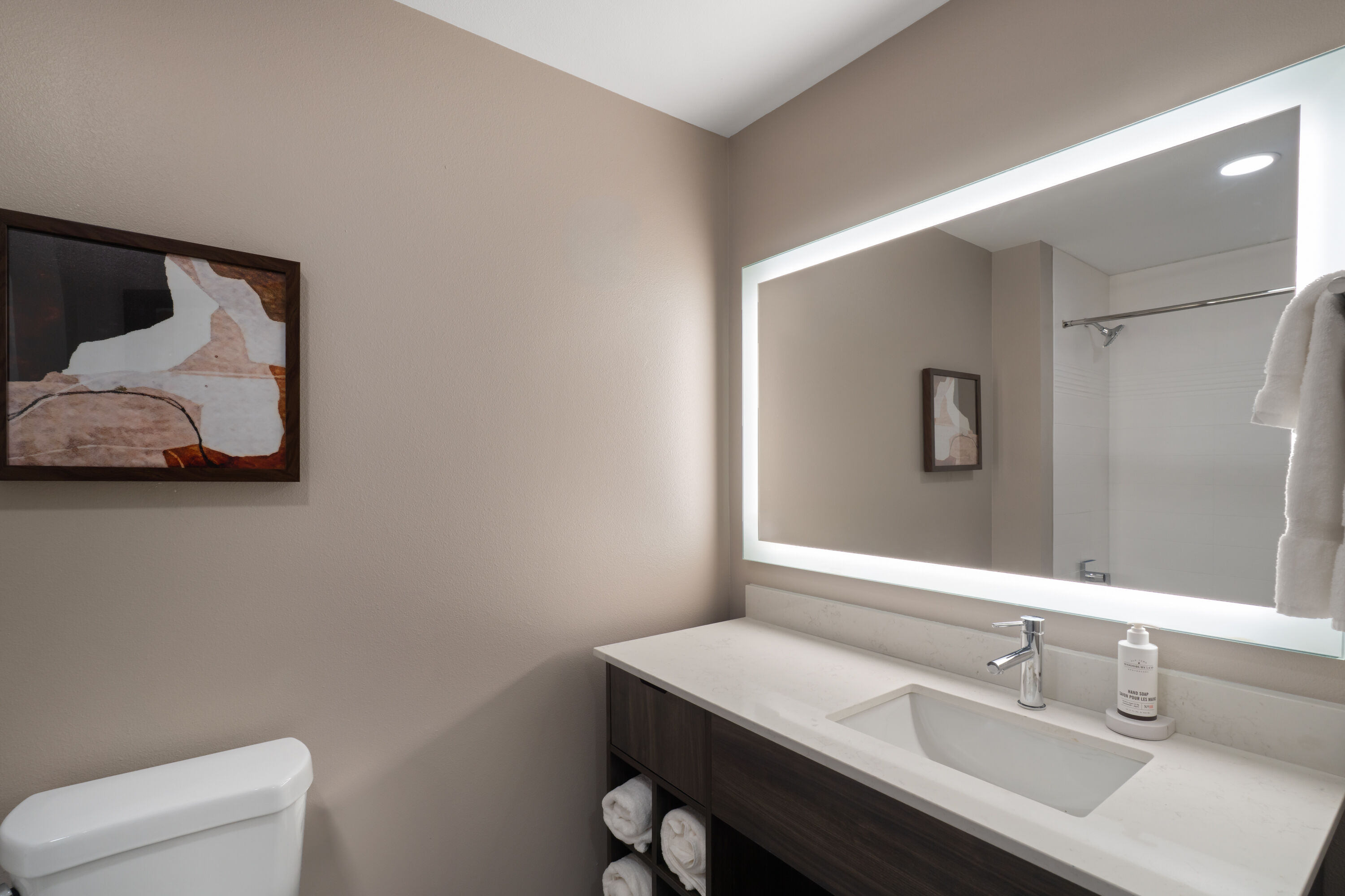 Guest room bath at the La Quinta Inn & Suites by Wyndham Tracy in Tracy, California