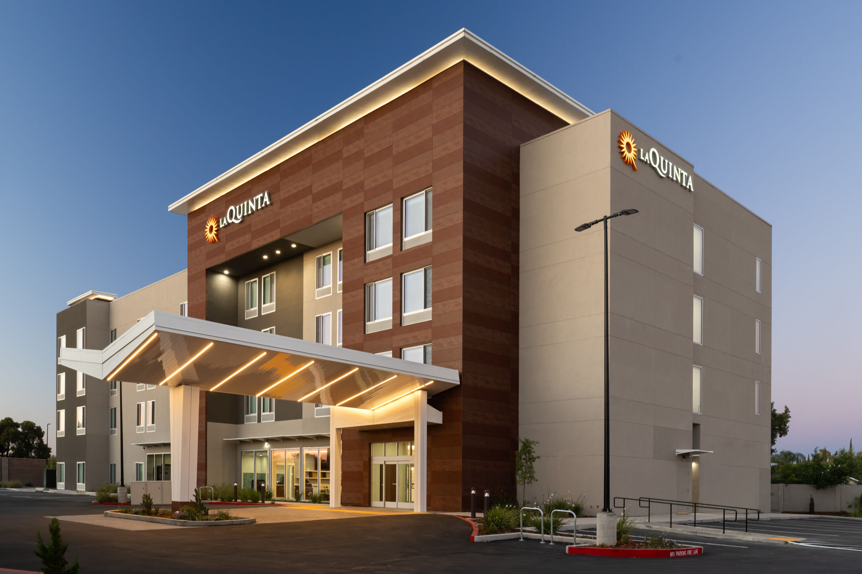 Exterior Dusk Image of La Quinta Inn & Suites by Wyndham Tracy hotel in Tracy, California